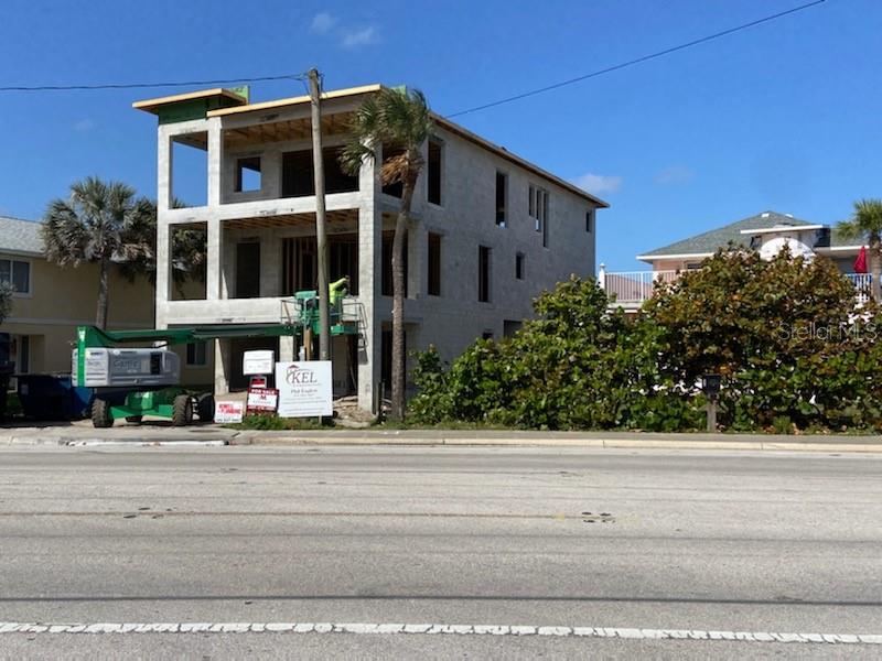 Move in November 2022! Unobstructed ocean view luxury three story 5 bedroom 5 1/2 bath dream home a few blocks south of Flagler Ave. Four bedrooms on the second and third floors with ensuite bathrooms. Huge master and family room have ocean views and separate 300 sq ft balconies. In-law suite is on the first floor connects to the rest of the home through the three story elevator or stairs. High end appliances and marble ceramic finishes. Professionally designed home. A 3 1/2 car garage and two separate entrances to the main home and in-law suite. Located in the short term nightly rental area. Plenty of room in the backyard for an outdoor pool/spa/summer kitchen. There's a huge rooftop deck with 360 degree views of the ocean, sunrises and sunsets. At CO for the home, price will increase by $100,000.00. Finishes include: Gourmet chef's kitchen, custom white oak shaker cabinets, GE monogram appliances, marble and ceramic flooring, sonos surround sound, shiplap details, custom light and plumbing fixtures, gas plumbing and water for hot tub on roof top crows nest and prewired for electric car charging. ;Water: City
