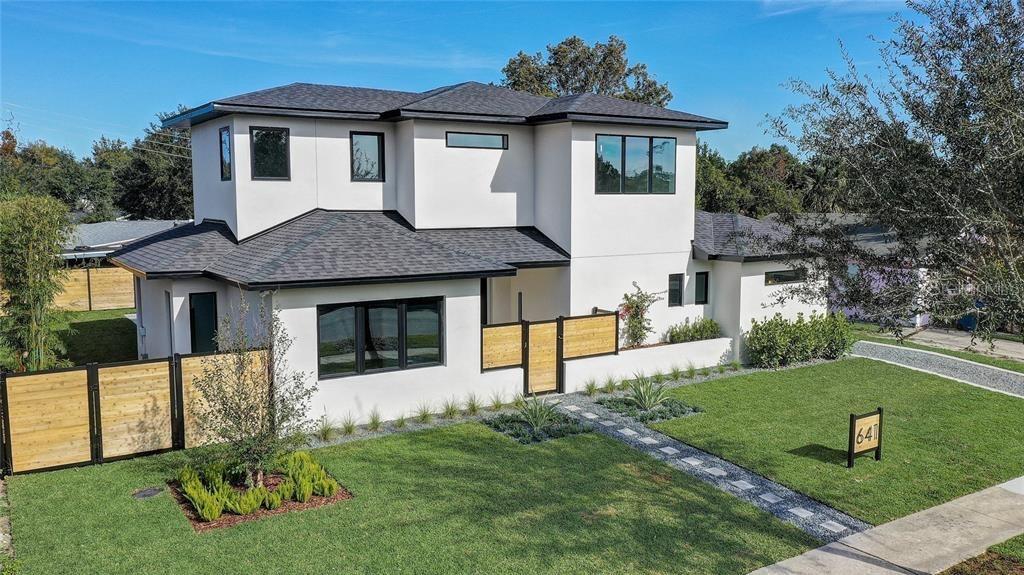 Tucked away on a peaceful cut-de-sac in the heart of Winter Park, this striking modern residence offers a rare blend of privacy, walkability and refined design. A private courtyard entrance sets the tone, creating a serene arrival and sense of retreat from the moment you step onto the property. 
Inside, polished concrete floors and an open, light-filled layout define the home's contemporary aesthetic, with clean lines and seamless flow designed for everyday living and effortless entertaining.
Step outside to your own private oasis- complete with a pool and tranquil outdoor spaces- perfect for enjoying Florida living year-round.
The home's prime location allows for an exceptional lifestyle- just a short stroll to Park Avenue's renowned shops and dining and an even shorter stroll to the golf course. Offering a unique combination of modern design and in-town convenience, this is Winter Park living at its most elevated.