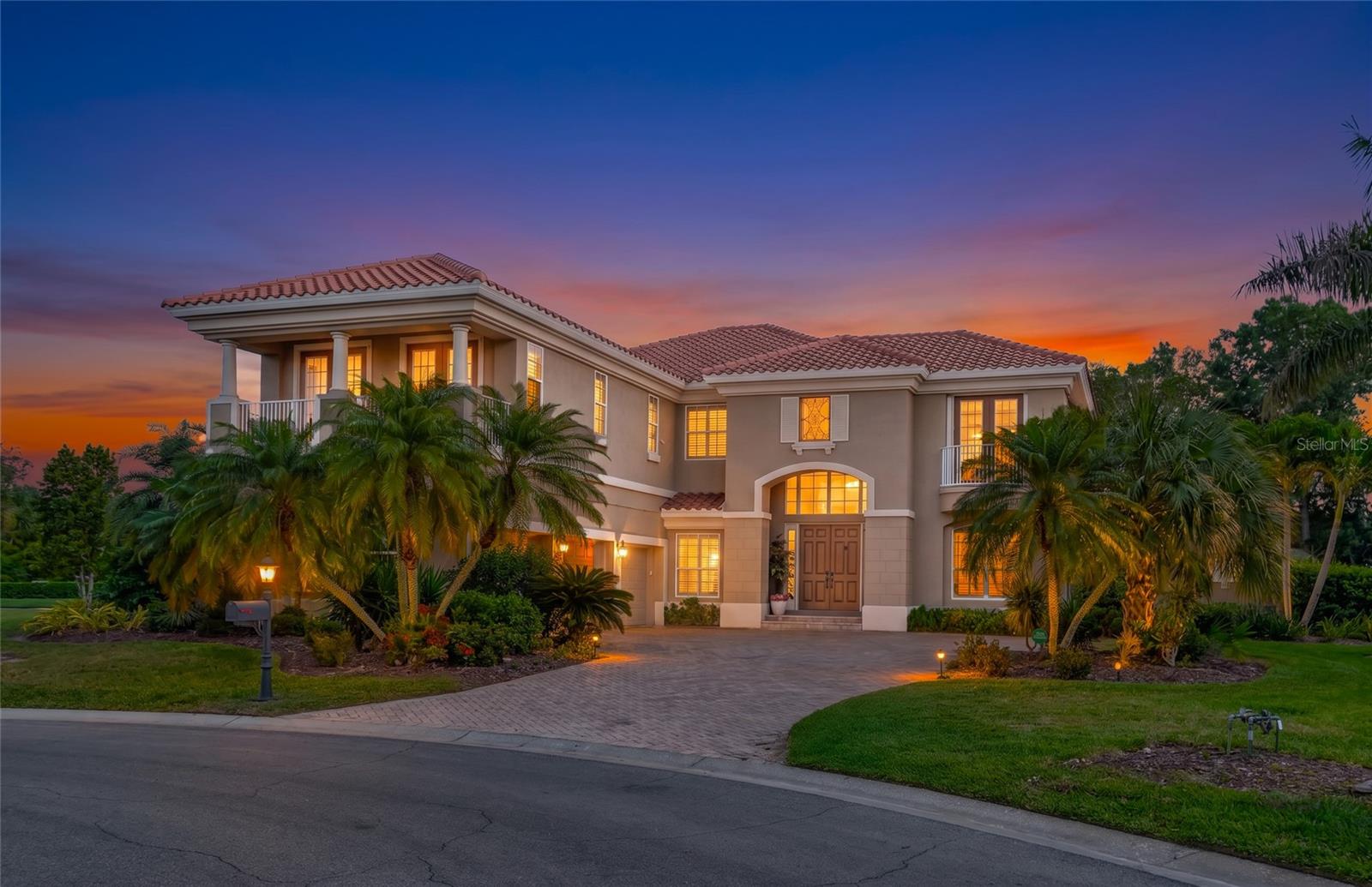 Located within the gated community of Waterlefe Golf & River Club, this residence on Big Bass Place offers a compelling mix of privacy, space, and meaningful structural upgrades, paired with a layout that works for everyday living. Set along a quiet interior street, the home immediately makes an impression with 22-foot soaring ceilings and a bright, open interior that creates volume without sacrificing defined living areas.

The main living spaces are designed with both comfort and function in mind, flowing seamlessly between the great room, dining area, and kitchen. Granite countertops, ample cabinetry, and a practical layout make the kitchen equally suited for daily use or hosting. The primary suite is generously sized and thoughtfully separated for privacy, featuring dual walk-in closets and a rare his-and-her bathroom configuration, along with a garden tub that adds a classic, relaxed touch. Additional bedrooms offer flexibility for guests, extended stays, or a dedicated office.

From a systems and maintenance standpoint, the heavy lifting has already been done. The home features a newer roof backed by a 30-year warranty, two HVAC units replaced within the past 18 months, and a whole-house generator—improvements that matter and significantly reduce near-term ownership concerns. The pool cage has also been fully refurbished and freshly painted, giving the outdoor space a clean, updated feel.

Out back, the covered lanai takes full advantage of the private setting, creating a comfortable space to relax or entertain. A full summer kitchen and dedicated pool bath add real functionality, making this an outdoor area that’s actually usable year-round—not just for show.

Waterlefe continues to stand out as one of the more established communities in the area. Set along the Manatee River, it offers direct boating access via a community marina, a rarity for a golf community. Residents also have access to a championship golf course (optional membership), clubhouse with dining, fitness center, resort-style pool, and a full calendar of social events that keeps the neighborhood active without feeling transient.

With 24-hour guarded entry, mature landscaping, and a track record that’s held up over time, Waterlefe attracts buyers who understand the difference between new and proven. Whether it’s a primary residence, seasonal home, or long-term hold, this property checks the boxes that actually matter in today’s market.