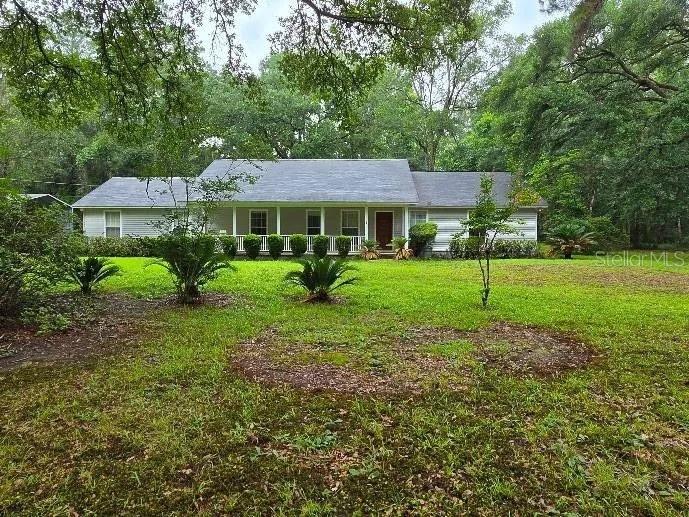 Rarely does a property come to market that so completely captures the essence of serene, private country living within easy reach of a vibrant capital city, yet 6794 Sturmer Place in Tallahassee, Florida does precisely that. Situated in the coveted 32311 zip code of Leon County, this distinguished single-family ranch-style residence has been loved and carefully maintained by its original owner since the very day construction was completed in 1994 — a fact that speaks eloquently to both the outstanding quality of the home and the exceptional setting that made it a lifetime choice from the very outset. Approached through a landscape of genuine leafy tranquility, the kind of hushed, tree-canopied calm that is increasingly rare and precious in today's market, the property sits upon a sweeping 2.86-acre lot that affords a remarkable degree of natural privacy. Wooded views frame all aspects of the grounds, creating the feeling of a secluded country retreat while remaining within an easy and convenient commute of Tallahassee's excellent schools, shops, restaurants, and amenities. The residence itself offers a generous and well-considered 2,080 square feet of single-storey accommodation, arranged across three comfortable bedrooms and two full bathrooms, with an open and inviting floor plan that encourages both relaxed family living and effortless entertaining. The kitchen, complete with a charming breakfast area, provides a warm and convivial hub for daily life, while the defining interior feature is undoubtedly the beautiful light-filled rear sunroom — a serene glass-framed sanctuary that draws the wooded landscape inward and offers an idyllic spot for morning coffee, afternoon reading, or simply absorbing the peaceful natural surroundings at any hour of the day. A covered porch extends the living experience gracefully into the fresh open air, perfectly positioned to enjoy the mature trees and gentle breezes that characterize this remarkable parcel through every season. Beyond the main residence, the property excels in practical versatility. An attached

two-car garage serves the home with everyday convenience, while an impressive array of outbuildings — including a spacious detached garage and well-equipped workshop — cater to every project, hobby, and storage requirement imaginable. Of particular note is the expansive carport, generously proportioned to accommodate a full-sized boat or RV with ease and room to spare, making this an outstanding proposition for those who embrace an adventurous and active outdoor lifestyle. With no HOA restrictions to limit how you use or enjoy the land, the full 2.86 acres are entirely and freely yours — a freedom recognised and deeply treasured by the original owner for over three decades, and one that any fortunate successor will appreciate with equal measure. Properties of this calibre, combining original-owner provenance, generous acreage, outbuildings of this scale, and a setting of such enduring leafy beauty and serenity, reach the open market only with extraordinary rarity. 6794 Sturmer Place is not simply a house, it's a lifestyle, a sanctuary and a singlar opportunity.