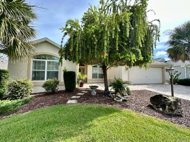 Discover your dream LONG TERM, FURNISHED rental home in the Village of Bonita! This meticulously designed residence offers an abundance of natural light, thanks to skylights throughout. With a split floor plan, privacy is assured, while the entire house is adorned with upscale upgrades. The seamless blend of tile and wood flooring enhances the elegance. This home offers multiple dining options from an eat-in kitchen to a formal dining area. The open concept kitchen and living area provide a spacious ambiance, while the additional heated and cooled sunroom offers breathtaking views of your private putt-putt course and tranquil pond. The versatile sunroom can be left open or closed off, and the screened-in lanai invites you to enjoy the outdoors. With a 2-car garage featuring built-in storage, impeccable curb appeal, mature landscaping, and all-inclusive rent covering water, sewer, trash, lawn maintenance, and pest control, this home is a true gem. The primary suite features access to the sunroom and custom his and her walk-in closets. The primary bathroom features his and her sinks and a large walk-in shower. Located in the Village of Bonita, it offers quick access to all three Squares in under 7 miles. Don't miss this exceptional opportunity—schedule a viewing today and make this dream home yours!