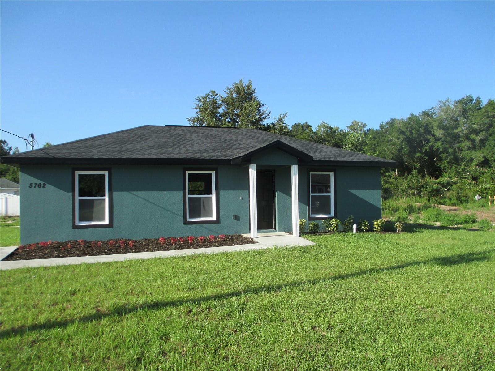 New construction of 3 bedroom 2 bath home in the popular Ocala Ridge subdivision. This home is just minutes from WEC, the Ocala airport, shopping, churches and restaurants. This home features a split bedroom layout with combination room of living room, kitchen and dining area. The stainless steel appliance package includes refrigerator, dishwasher, range, and microwave and will be installed prior to closing.