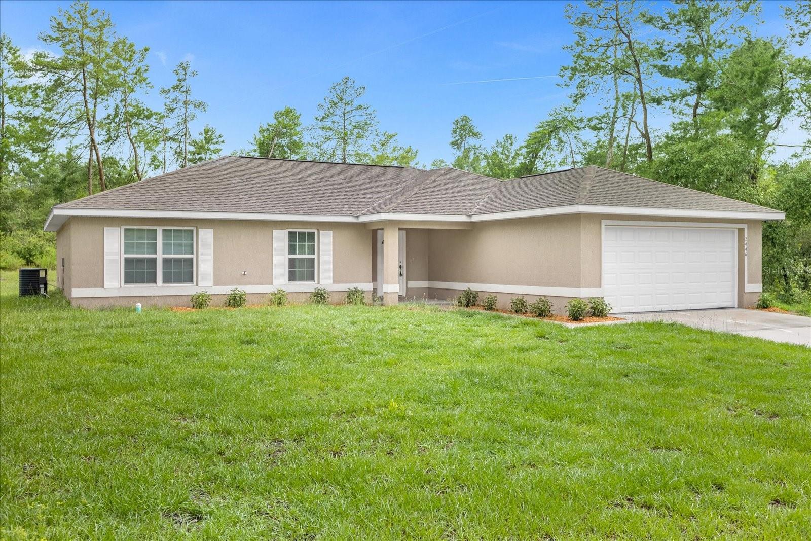 NEWLY BUILT IN 2021! Move-in ready 4 Bed, 2 Bath home with over 1,700 square feet located in the highly desirable Marion Oaks community - NO HOA! Enter the home to an open concept floor plan featuring a spacious living room, dining area, and kitchen with granite countertops, a pantry, and brand new stainless steel stove. This home also has brand new luxury vinyl plank flooring in the living spaces and tile in all wet areas. Other upgrades include a full size utility room with washer/dryer hookup, 2-car garage, extended driveway, and a large backyard with no rear neighbors, perfect for privacy! Located just minutes from the Marion Oaks Community Center, Sunrise Elementary School, Horizon Academy, and conveniently nearby highway I-75 to Orlando, Universal, and Disney World. Submit your offer today!