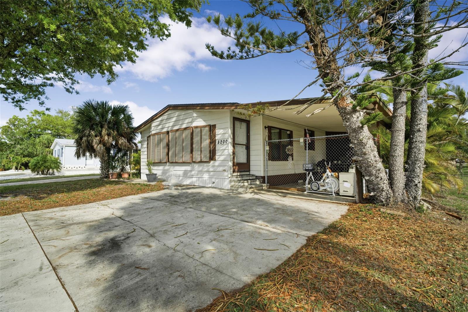 BUYER’S FINANCING FELL THROUGH — Don’t miss your second chance to own this beautiful, spacious manufactured home in a great location. Homes like this don’t stay available for long!Ever wanted to relive the charm of the early 2000’s? Here’s your chance. This 2-bedroom, 2-bath home brings back the nostalgic interior style of the era but with the big ticket items already taken care of. The roof, plumbing, and HVAC have all been updated within the last 6 years, giving you peace of mind while you decide whether to keep the retro vibe or add your own modern touch.

Sitting on a rare spacious lot in a quiet Englewood neighborhood, the property offers plenty of outdoor space, room for parking, and the laid-back Florida lifestyle just minutes from Englewood Beach, shopping, and local restaurants.

Whether you’re looking for a primary residence, seasonal getaway, or investment opportunity, this home gives you solid fundamentals with tons of potential to make it your own.

Come see it before someone else grabs this slice of Florida living.