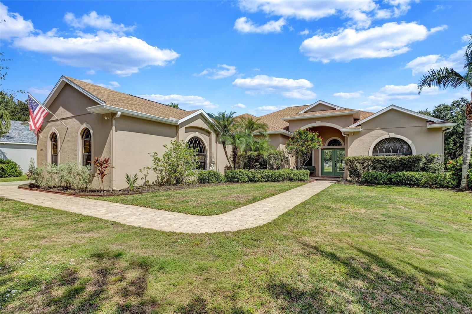 Set within a quiet cul-de-sac in desirable Country Creek, this four-bedroom, three-bath home built by La Maison. Tall ceilings and generous windows fill the home with natural light, while newer flooring throughout and a new roof (2024) make it truly move-in ready. The kitchen’s warm wood cabinetry anchors the living spaces, and the home’s thoughtful design includes a central vacuum system and plumbing in place for a future pool. The primary suite offers a private retreat with both a soaking tub and a separate shower. Out back, the most picturesque setting awaits — tranquil lake and preserve views, with plenty of space to create the outdoor oasis you’ve always imagined. With oodles of room for a pool, low HOA fees, and no CDD costs, this home blends comfort, value, and beauty in one of the area’s most naturally scenic communities.