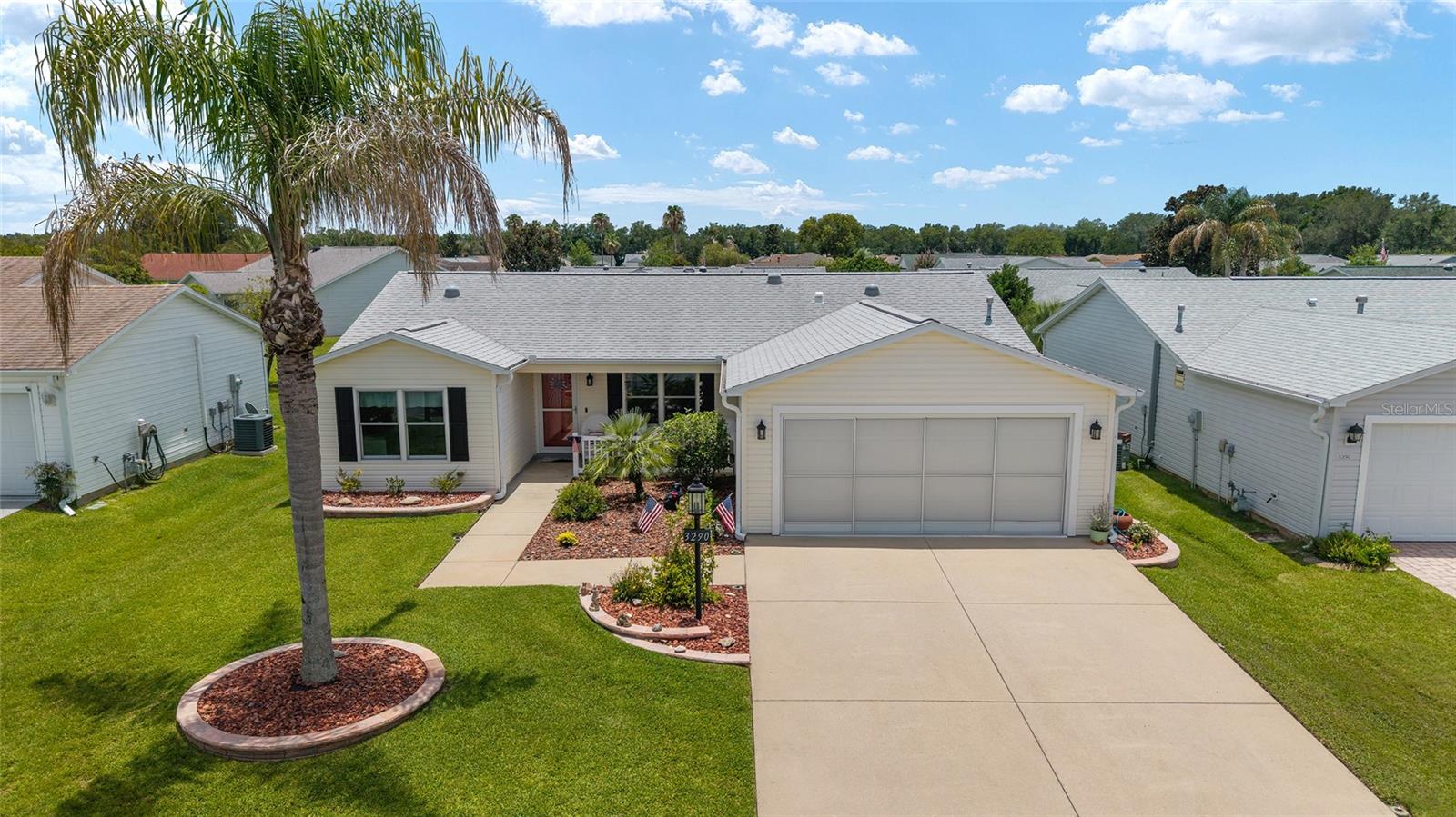 Welcome to this Meticulously Maintained Stetson III Model, with Thoughtful Upgrades Throughout.  ** Best Of all, the BOND IS PAID!!! Providing Significant Savings for the Next Owner. ** This 3-Bedroom, 2-Bath Home Features Vaulted Ceilings, Abundant Natural Light, and an Inviting Open-Concept Floor Plan Designed for Both Everyday Living and Entertaining. ** Recent Major Updates Include a New Roof (2020), HVAC System (2018), Gas Water Heater (2019), Water Softener (2019), Reverse Osmosis System (2019), and New Interior Windows (2022). ** The Home also includes a TERMITE BOND and Radiant Heat Barrier in the Attic. ** The Spacious Kitchen is a true centerpiece… Featuring Luxury Vinyl Plank Flooring, GRANITE COUNTERTOPS, Raised-Panel Cabinetry with Pull-Out Shelving, Under- and Over-Cabinet Lighting, a Center Island with Breakfast Bar, Deep Porcelain Sink, Reverse Osmosis Water System, SOLAR TUBE, Recessed Lighting, and a Convenient Pass-Through Window To The Enclosed Lanai. STAINLESS SAMSUNG APPLIANCES Complete the Space ** The Adjoining Dining and Living Areas Showcase Vaulted Ceilings and Luxury Vinyl Plank Flooring. creating an Open and Airy Atmosphere, Perfect for Gathering with Family and Friends. ** A Bright Florida Room Extends the Living Space and Overlooks the Backyard, while the Glass-Enclosed Lanai Offers Year-Round Comfort with its own Mitsubishi Mini-Split Heating and Cooling System, Floor-To-Ceiling Windows, Ceiling Fan, and Direct Access to the Rear Patio and Garden Area. ** The Private Primary Suite Features Luxury Vinyl Plank Flooring, a Walk-In Closet with Built-In Organizers, and an En-Suite Bath Complete with QUARTZ Vanity, Solar Tube, Comfort-Height Commode, Linen Closet Storage, and a Beautifully Enhanced Shower with Multiple Shower Heads and Safety Grab Bar. ** The Guest Suite provides Two (2) Comfortable Bedrooms and an Updated Guest Bath Featuring a QUARTZ Vanity, Upgraded Tub Surround with 2 Grab Bars, SOLAR TUBE, and Comfort-Height Commode. *** Additional Highlights include an Inside Laundry Room with Built-In Pantry and Cabinetry, Utility Sink, GE Stacked Washer and Gas Dryer, SOLAR TUBE With Night Light, and a Germicidal UV Light System Integrated into the HVAC Equipment. ** Outside, the Home Offers Exceptional Curb Appeal with a Covered Front Porch, Attractive Rock-Mulched Landscape Beds, Stacked Brick Garden Edging, Gutters and Downspouts, and a Charming Rear Garden Trellis. **The Two-Car Garage includes Built-In Cabinets, Workbench Area, Pull-Down Attic Access, Irrigation Controls, Water Softener, and a Convenient Sliding Screen Garage Door. *** This Move-In Ready Home Combines Comfort, Efficiency, And Numerous Upgrades in One Exceptional Package. >> Watch Our Video Attached to the Listing!!