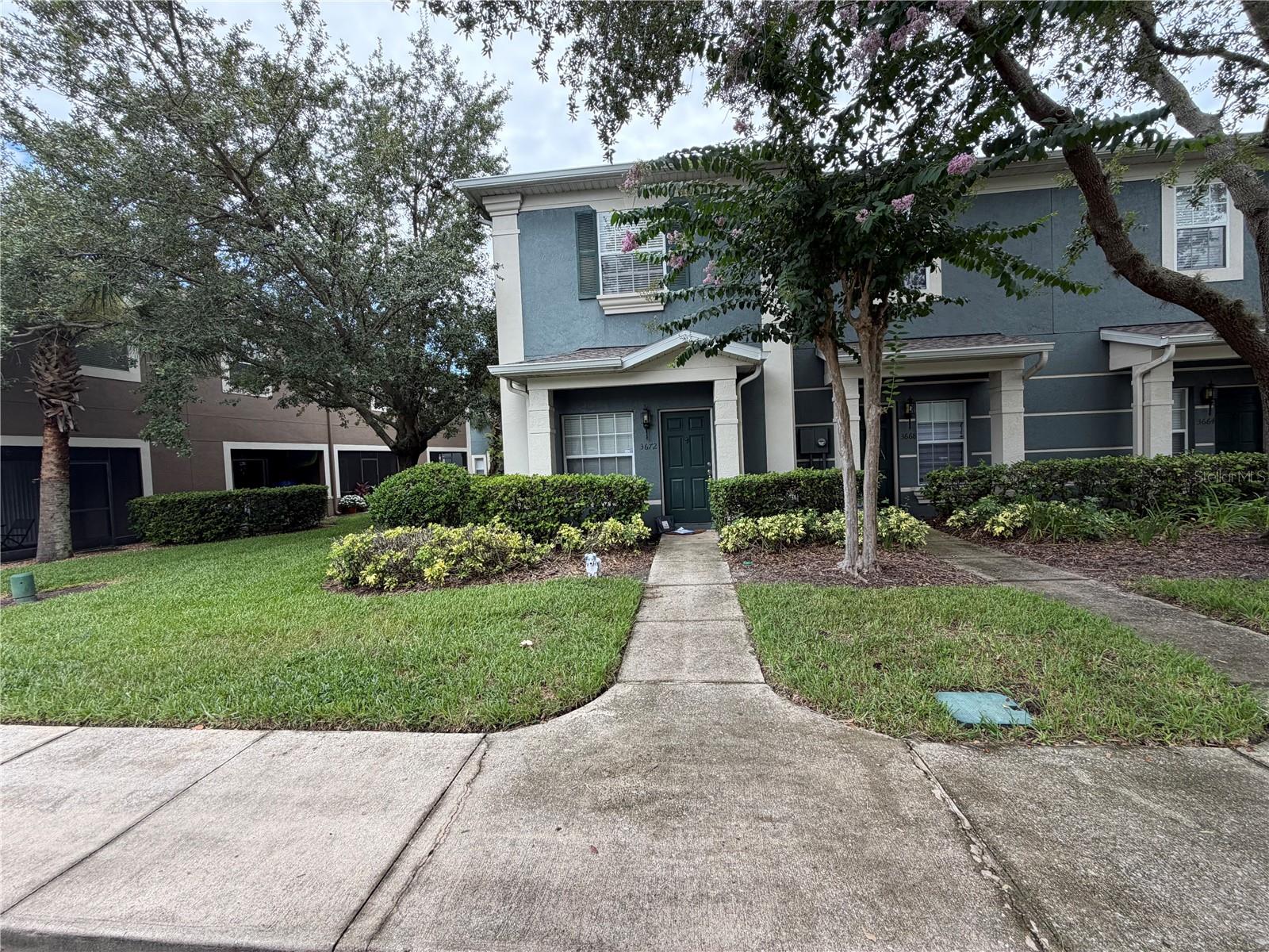 Available August 1st! Experience low-maintenance resort-style living in this beautiful corner-unit townhome located in the highly desirable, gated community of Victoria Pines. The bright and functional two-story layout features gorgeous ceramic tile flooring throughout the downstairs living areas and cozy carpeting upstairs. Both spacious bedrooms are located on the second floor and feature private ensuite bathrooms, offering the perfect setup for ultimate privacy and comfort. Residents enjoy exclusive access to fantastic community amenities, including a sparkling resort-style pool, a modern fitness center, a welcoming clubhouse, walking trails, and a dedicated dog park. Conveniently positioned in a prime, central location, this home offers quick access to major highways like the 417 and 528, putting the Orlando International Airport (MCO), Lake Nona Medical City, Valencia College, and downtown Orlando just minutes from your front door. Inquire now to schedule your tour and secure this exceptional property!