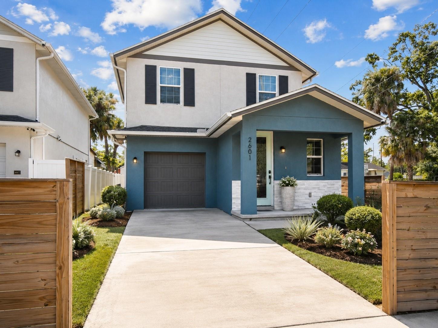 Virtually Staged. Impeccably maintained and move-in ready, this beautiful 3-bedroom, 2.5-bath home built by Domain Homes offers the perfect blend of modern comfort, convenience, and urban lifestyle. Situated on a spacious corner lot in the heart of Tampa, this residence delivers an exceptional location just minutes from the city’s top attractions, restaurants, and cultural hubs. Step inside to discover an inviting OPEN FLOOR PLAN featuring upgraded STAINLESS-STEEL APPLIANCES, GRANITE countertops, CERAMIC TILE flooring throughout the first level, and a one-car GARAGE. Upstairs, the primary suite includes a WALK-IN closet and ensuite bath, while two additional bedrooms provide flexible space for guests or a home office. Recent upgrades include CROWN MOLDING throughout the first floor and primary suite, CUSTOM BUILT KITCHEN CABINETS with a coordinating backsplash, and built-in storage cabinetry for added functionality. The living and dining rooms feature decorative 3D porcelain ACCENT WALLS, while the kitchen includes added pendant lighting and UPGRADED WIRING. All bathrooms have been UPGRADED with new 3D tile, upgraded LED mirrors, and DESIGNER PENDANT LIGHTING. The staircase has been enhanced with a 15-foot decorative mirror and CUSTOM-BUILT SOLID RED OAK WOOD, replacing the original carpet. Beyond the home’s comfort and design, the location defines the lifestyle: DOWNTOWN TAMPA ~ 8 minutes RIVERWALK ~ 9 minutes ARMATURE WORKS ~ 10 minutes Historic YBOR CITY ~ 6 minutes Tampa INT'L AIRPORT ~ 17 minutes I-275, I-4, and Selmon Expressway access ~ within 5 minutes Enjoy effortless proximity to Tampa’s award-winning restaurants, boutiques, and waterfront entertainment while still being tucked away on a quiet residential street. Whether heading out for a night in Ybor, brunch at Armature Works, or a quick commute downtown, this address makes city living convenient and connected. This home offers the rare opportunity to experience the best of urban Tampa living with the comfort of a newly constructed residence — all move-in ready and waiting for its next owner. The possibilities are endless. You deserve it!!