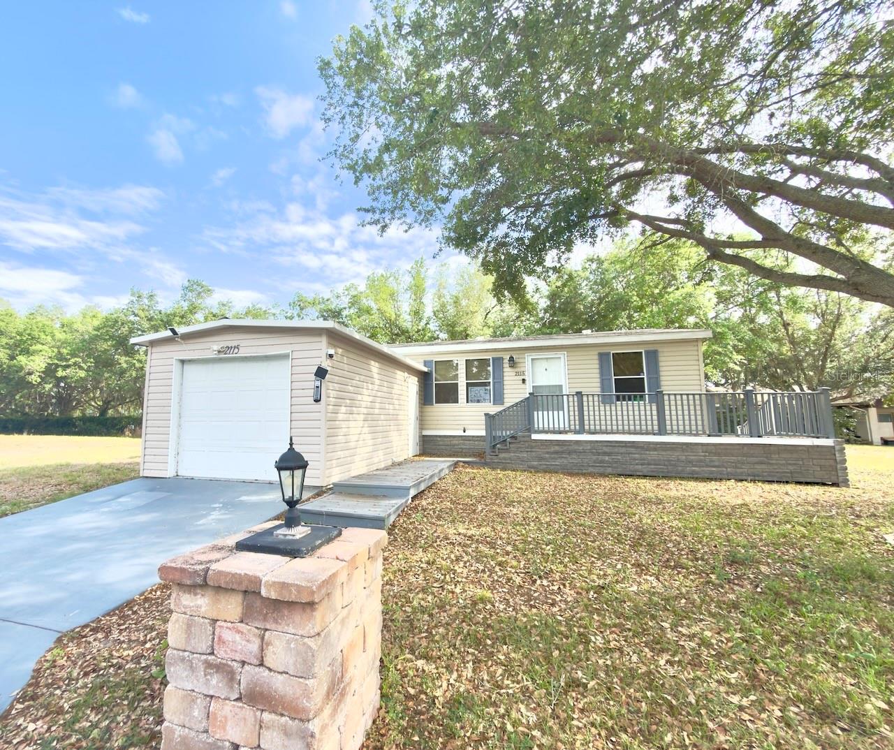 3-bedroom, 2-bath 2019 manufactured home located in the heart of Lakeland. This well-maintained home offers a functional open layout with comfortable living spaces, a bright kitchen with ample cabinet storage, and generously sized bedrooms. The primary suite features a private bath for added convenience. Enjoy a large yard with plenty of room for outdoor entertaining, pets, or gardening. Conveniently located near shopping, dining, schools, and major roadways for an easy commute. A great opportunity for homeowners or investors alike! 55+ community