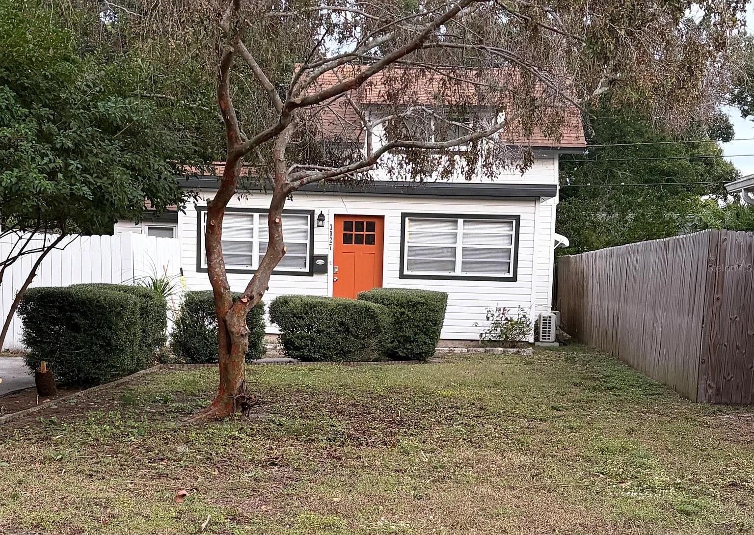 Welcome to 3027 Melton Street N, a charming St. Petersburg home full of character, warmth, and thoughtful updates. Offering 2 bedrooms, 1 bathroom, and 1,044 heated square feet, this inviting property blends classic appeal with everyday comfort.

From the moment you arrive, the home’s curb appeal stands out with its welcoming front porch, attractive exterior, and eye-catching front door. Inside, you’ll find a bright and open living space with beautiful wood-look flooring and plenty of natural light. The kitchen has been tastefully updated with granite countertops, white cabinetry, subway tile backsplash, and stainless steel appliances, creating a clean and modern feel that’s perfect for daily living and entertaining.

The layout offers flexibility with comfortable bedroom spaces, a spacious living area, and an inside laundry room for added convenience. Sliding glass doors lead to the outdoor area, giving the home a light, airy feel and creating a seamless connection to the backyard. The fenced yard provides privacy and room to relax, garden, or entertain.

Located in St. Petersburg, this home is a great opportunity for a buyer looking for charm, function, and style in one package.