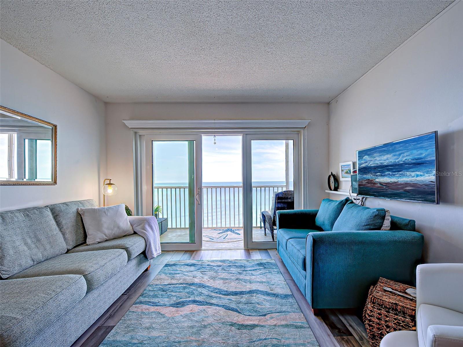 10th Floor Island Oasis – Unobstructed Gulf Views! Experience the ultimate Venice Island lifestyle from this impressive 10th-floor beachfront condominium at Venice Sands. Perfectly positioned directly on Venice Beach, this 2-bedroom, 2-bathroom residence offers a front-row seat to sweeping, unobstructed panoramas of the Gulf, pristine sands, and vibrant evening sunsets. Step out onto the beachfront balcony to watch dolphins play, feel the gulf breeze, and enjoy complete peace and quiet. Luxury laminate flooring throughout makes for easy clean up. The property also features extra conveniences including one dedicated carport space and a private storage unit. Beyond the unit itself, Venice Sands offers a secure, exceptionally well-maintained environment boasting a brand-new roof, new lanai screens, new carports, a beautiful beachside swimming pool, and an active social scene in the clubhouse. It is a welcoming community where owners and their guests frequently gather for happy hour, book clubs, or just to chat over a cup of tea. Best of all, you are situated less than two miles from the heart of downtown Venice Island, giving you effortless access to charming boutique shopping, gourmet restaurants, parks, and the Venice Theatre. Come home to where paradise is created daily. Being sold partially furnished as a convenience to the new owner.