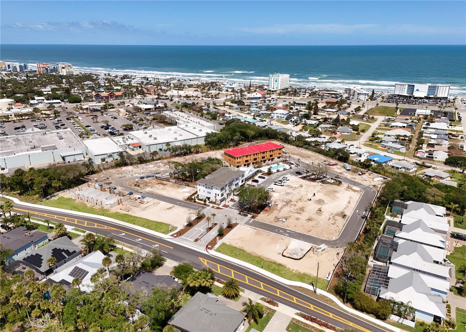 Under Construction. Experience effortless coastal living in the beautifully appointed Seaglass, a thoughtfully designed three-story townhome offering 3 bedrooms, 2.5 baths, and flexible living spaces to fit your lifestyle. The oversized two-car garage provides exceptional storage for vehicles, paddleboards, surfboards, and beach gear, and includes a dedicated electrical outlet ready for a golf cart or future EV charger.

The first level features a spacious flex room perfect as a game room, home office, fitness space, or guest retreat. Upstairs, the open-concept main living area is designed for entertaining, seamlessly connecting the great room to a private outdoor deck. The gourmet kitchen showcases GE Profile® stainless steel appliances, a built-in wall oven and microwave, cooktop with contemporary hood, an oversized island with designer pendant lighting, quartz countertops, tile backsplash, a large walk-in pantry, and elegant light gray 42-inch shaker cabinetry with crown molding and soft-close doors and drawers.

The third floor offers a light-filled primary suite featuring a tray ceiling, oversized walk-in closet, and a luxurious bath with quartz countertops, light gray shaker cabinetry, and a floor-to-ceiling 4x12 subway tile shower. Two additional bedrooms, a full bath, and a conveniently located laundry room complete the upper level.

Designer finishes throughout include light wood-look luxury vinyl plank flooring in all main living areas, the primary suite, and on the staircase, tile flooring in all bathrooms, plush carpet in secondary bedrooms, an open-railing staircase, 8-foot two-panel interior doors with modern lever hardware, and upgraded 4¼-inch baseboards. Combining sophisticated finishes with a functional layout just minutes from the beach, the Seaglass offers the perfect blend of style, comfort, and coastal convenience.