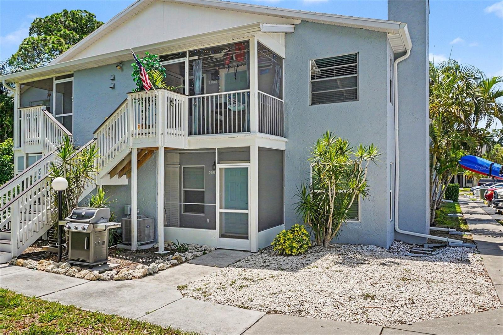 Welcome to home sweet home in the Mirror Lake community of West Bradenton. This delightful ground floor corner condo offers the perfect blend of comfort and convenience with two spacious bedrooms and two full bathrooms. Step inside to discover the completely updated details that make this home special...tastefully done to allow a calm and peaceful at home feeling. Spend relaxing time in the screened in front lanai overlooking a park like community greenspace. The building's exterior has recently been completely refurbished. The Sellers added new hurricane rated windows and new HVAC. Pet friendly with one pet up to 30 pounds welcome. Assigned parking and guest parking. Low monthly fees include exterior maintenance, basic cable and wifi, heated year round pool and spa, tennis, pickleball and a fitness center. Minutes from endless dining, shopping, and cultural opportunities, IMG Academy and our beautiful beaches.