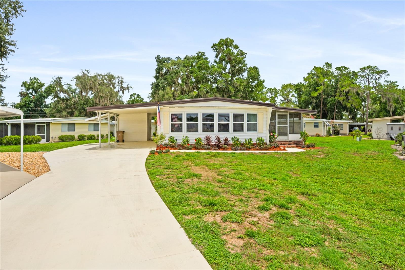 The perfect Florida lifestyle begins here! If you've been dreaming of a home that feels brand new without paying the price of new construction, your search is over. This exceptionally renovated and beautifully furnished 2-bedroom, 2-bath residence offers approximately 1,300 square feet of impeccable living space in the highly sought-after, resident-owned community of Hawthorne at Leesburg.

Extensively rebuilt with quality and care, nearly every major component has been replaced or upgraded. Improvements include a new roof, completely rebuilt subflooring, beautiful new flooring throughout, new water heater, fresh interior paint, updated landscaping, quality appliances, and countless additional improvements that make this home feel fresh, stylish, and worry-free for years to come.

Step inside and you'll immediately appreciate the bright, open floor plan, tasteful décor, and meticulous attention to detail. The spacious Florida room creates the perfect setting for relaxing with a morning coffee, entertaining friends, or enjoying your favorite hobby. The beautifully updated kitchen features abundant cabinetry, upgraded stainless steel appliances, attractive countertops, decorative backsplash, and generous storage.

Offered beautifully furnished, this home is truly move-in ready. Simply bring your suitcase and begin enjoying everything Central Florida has to offer.

Nestled within the beautifully landscaped 78-acre gated waterfront community of Hawthorne at Leesburg, residents enjoy one of Florida's finest active adult lifestyles. The affordable monthly maintenance fee includes water, sewer, lawn maintenance, private emergency services, and storage for RVs, boats, and trailers.
The spectacular clubhouse offers full-time activities and more than 100 clubs and social activities, along with a fitness center, library, arts and crafts studios, billiards, card rooms, hospitality lounge, geo-thermally heated swimming pool, two enclosed therapeutic pools, and an electronically secured private marina with more than 120 boat slips providing direct access to the scenic Harris Chain of Lakes.
Beautifully renovated. Beautifully furnished.  Homes of this caliber offering this level of luxury living rarely come on the market. Don't miss this opportunity to own a home that offers exceptional quality, outstanding value, and the carefree Florida lifestyle you've been waiting for.
Seller is a Florida Licensed Brokerage  Owner Financing may be considered.