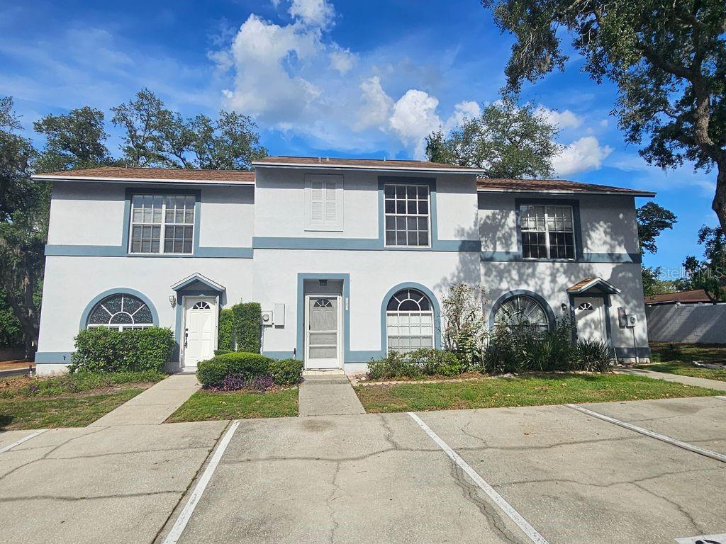 Welcome home to this charming 2-bedroom, 2.5-bath townhome tucked away in one of Brandon’s hidden gem communities. Surrounded by mature oak trees and featuring a community pool, this corner-unit residence offers comfort, convenience, and low-maintenance living in the heart of town. Enjoy two assigned parking spaces right outside your door, a screened lanai perfect for relaxing or entertaining, and durable laminate flooring throughout for easy upkeep. Upstairs, you’ll find two spacious primary suites, each with its own private bathroom and walk-in closet, providing the ideal layout for roommates, guests, or flexible living. Conveniently located near shopping, dining, major highways, and all that Brandon and Tampa have.
