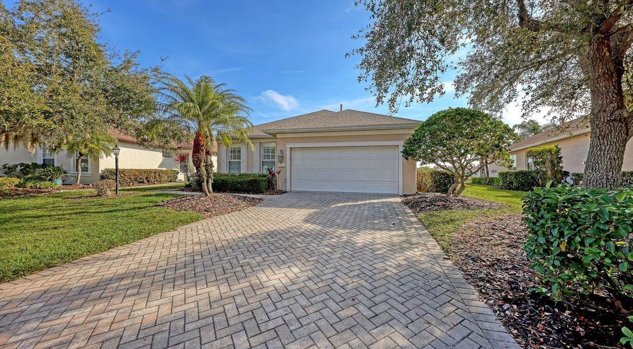 Welcome to this immaculate 2 bedroom, 2 bath home with a versatile den and a spacious 2 car garage, perfectly situated in the highly sought after gated community of University Place. Lovingly maintained in its original condition, this TURNKEY FURNISHED residence offers timeless quality, a smart layout, and a peaceful lake setting that provides privacy, tranquility and breathtaking sunrises.  Inside, the bright and open floor plan features a comfortable living area and a well designed kitchen overlooking the main living space. The primary suite serves as a serene retreat with a walk in closet and private bath. A generously sized second bedroom and full guest bath provide ideal accommodations for visitors or family. The additional den/flex space is perfect for a home office, hobby room, or quiet reading nook.  All this under a ROOF THAT WAS REPLACED IN 2023.  Step outside and enjoy the exceptional amenities that make University Place one of the area’s premier communities. Residents have access to two resort style pools, including a family friendly pool with a slide and zero entry design, plus a lap lane and hot tub at the second pool. Both recreation areas offer outdoor kitchens with natural gas grills—perfect for entertaining. Scenic walking trails wind around lakes with lighted fountains, Charleston inspired street lamps, and lush landscaping, creating a warm and inviting neighborhood atmosphere. An on site fitness center adds even more convenience.  The location is truly unbeatable. Nestled in the heart of Sarasota/Bradenton, you’re just moments from world class shopping and dining at UTC Mall, Whole Foods, Fresh Market, Starbucks, Benderson Park, and top rated golf, tennis, and pickleball facilities. The area’s stunning beaches—including Siesta Key Beach, ranked among the best in the world—are only a short drive away. Highly rated schools and easy access to I 75 complete the picture of comfort and convenience.  This home offers the perfect blend of lifestyle, location, and value. Don’t miss your chance to enjoy the best of University Place living in one of the region’s most desirable communities