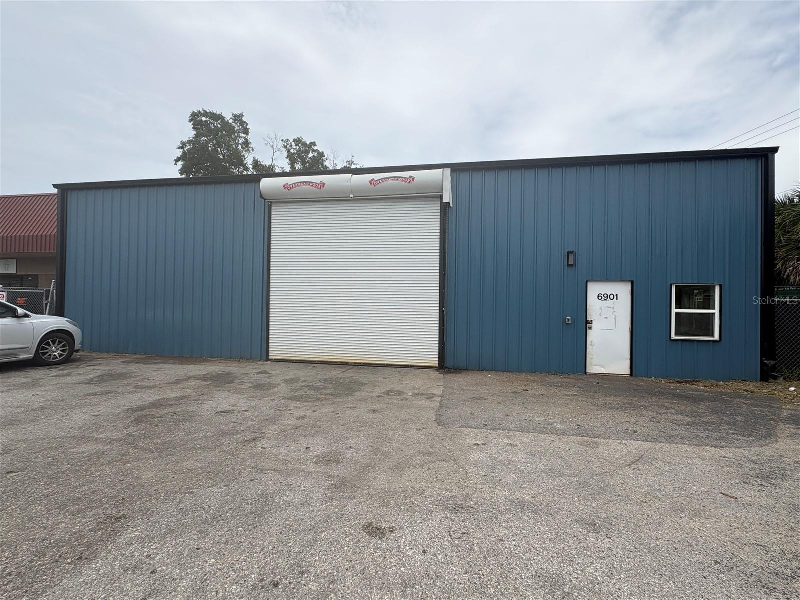 This 2,400 SF warehouse located on a 24,750 SF at the hard-lighted intersection of Benjamin Road and W. Sligh Avenue. There is a small office and restroom on the ground floor, as well as a bonus 2nd floor office overlooking the shop space. The building has 3-phase power and a large rollup door (14x14) along the frontage with a drive-thru design to large barn-style doors to the rear opening to the additional covered work area and wide open yard space offering efficient loading access and ample parking for employees and delivery vehicles. Generous clear heights enable flexible racking and equipment configurations.  The 1,200 SF covered area to the rear has 11' clearance bordered on two sides by two 40' storage containers. The property includes a 285 SF warehouse with restroom, 84 SF shed, and is fully gated with visibility and entries from both Benjamin Road and West Sligh Avenue.
Traffic count of 13,700 VPD

Located in Tampa just east of the Veterans Expressway offering easy access to surrounding areas.

Lease: 2,400 SF - Initial estimated monthly rent: $9,950 / month MG (plus applicable tax)