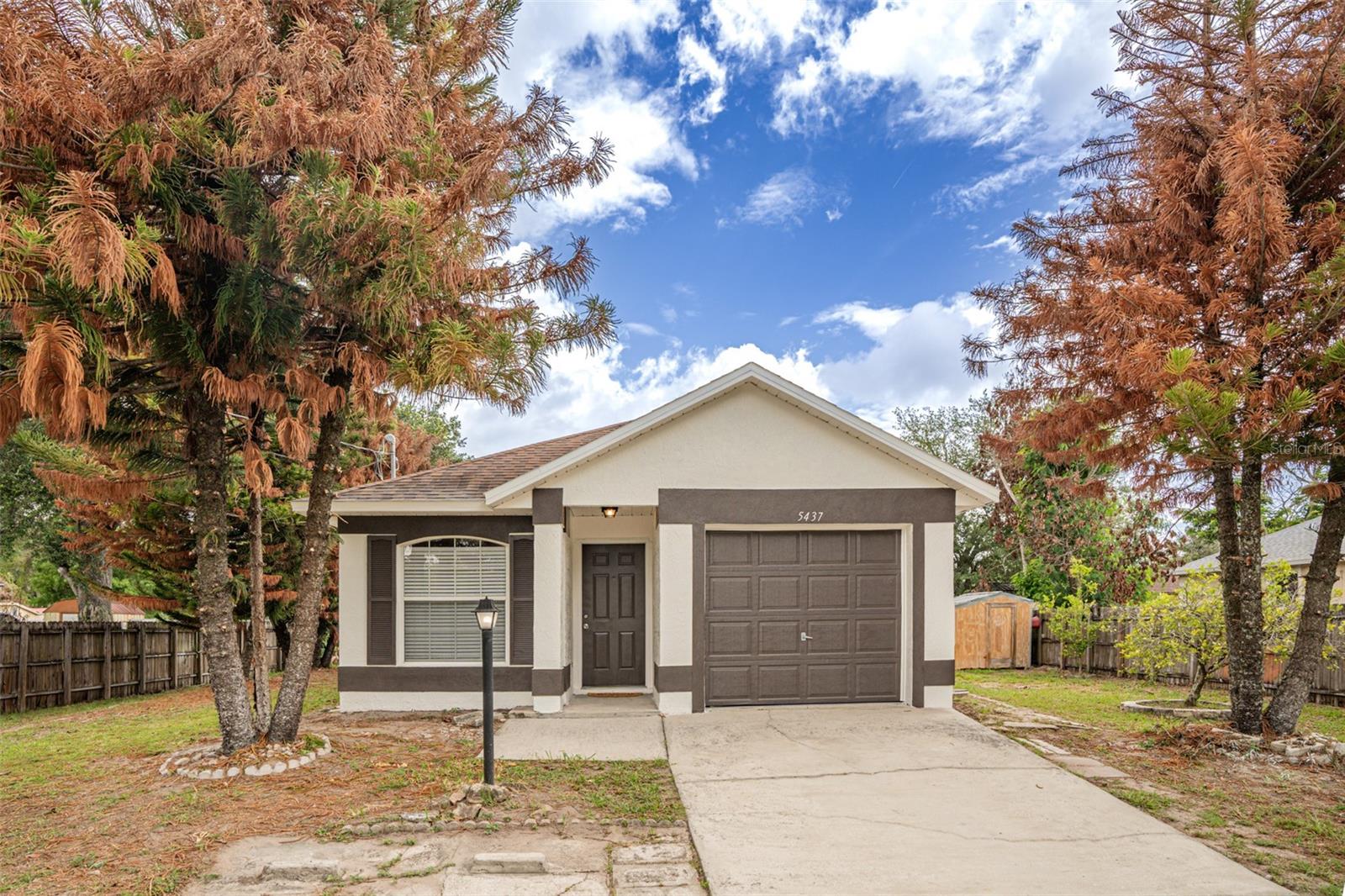 Virtually Staged. Welcome home to this charming 3-bedroom, 2-bathroom single family residence situated on a spacious lot of nearly 1/3 acre, with NO HOA! Freshly updated with new interior and exterior paint, this MOVE IN READY home features durable tile flooring throughout, offering easy maintenance and a seamless flow from room to room. The beautifully updated kitchen showcases new quartz countertops and brand new stainless steel appliances, while both bathrooms have been upgraded with stylish new vanities. Home comes with washer & dryer, newer 2017 roof, and a BRAND NEW 2026 AC unit just installed! Step outside and enjoy the oversize fenced private backyard, providing endless possibilities for entertaining, gardening, or pets. Ideally located and zoned for highly sought after Winter Park A rated schools, this property also offers exceptional convenience with easy access to Downtown Orlando, Full Sail University, Valencia College, the University of Central Florida, and Orlando International Airport. Whether you’re a first time homebuyer, investor, or simply looking for a space without HOA restrictions, this property delivers exceptional value, space, and location. Please call today for a private showing!