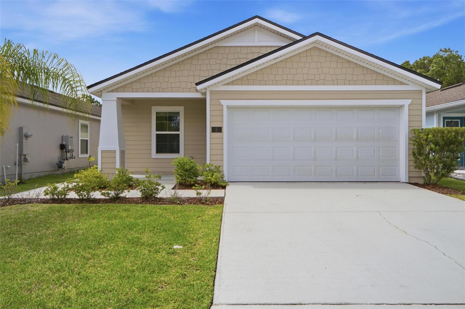 Virtually Staged. Short Sale. Welcome to Grand Reserve, a sought-after gated golf course community in Flagler County. Built in 2024, this beautifully  home offers modern living with an open-concept layout and energy-efficient features throughout.

The spacious kitchen features quartz countertops, ample cabinetry, and a seamless flow into the living and dining areas, creating an ideal space for everyday living and entertaining. The primary suite offers a private retreat with a walk-in closet and en-suite bath, while two additional bedrooms provide flexibility for guests, a home office, or hobbies. Vinyl flooring in the main living areas and plush carpeting in the bedrooms add both style and comfort.

Residents enjoy access to outstanding community amenities, including a clubhouse, fitness center, resort-style pool, racquetball courts, sidewalks, and beautifully maintained common areas. Nestled within a golf course community surrounded by natural beauty, this home offers the perfect balance of comfort, convenience, and lifestyle.

Conveniently located near Flagler Beach, shopping, dining, and major roadways, this move-in-ready home presents an excellent opportunity to enjoy all that Grand Reserve has to offer.