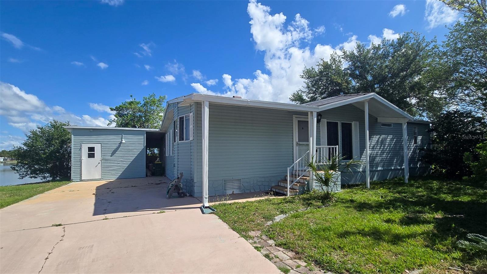Enjoy relaxed waterfront living in this 2-bedroom, 2-bath manufactured home located in the desirable gated 55+ community of Forest Lakes. This home features a spacious primary bedroom plus a versatile bonus room ideal for a home office or guest space. Take in peaceful lake views from your private wood deck--perfect for morning coffee or evening unwinding. Residents enjoy an active lifestyle with access to a clubhouse, pool, shuffleboard, and a full calendar of social events. RV storage is also available. With a low HOA and a welcoming atmosphere, this home offers the perfect blend of comfort, convenience, and community in the heart of Cocoa. Schedule your private showing today!