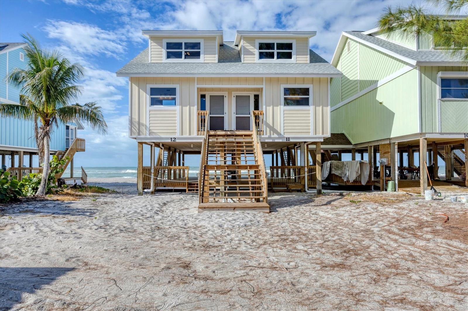 Beachfront Investment Opportunity on Don Pedro Island – Renovated Coastal Retreat with Rare Expansion Potential!

Experience the best of island living with this beautifully renovated 2-bedroom, 2.5-bath beachfront residence located in the sought-after Colony Don Pedro community. Offering incredible Gulf views, modern updates, and exceptional rental potential, this coastal escape is the perfect opportunity for investors, vacation homeowners, or those looking for a private island getaway.

OPPORTUNITY AWAITS—the adjoining unit is also available for purchase, giving buyers the option to own the entire building and create a spacious beachfront family compound or maximize investment potential with multiple rental opportunities.

Designed for relaxed coastal living, this thoughtfully updated residence features inviting indoor and outdoor spaces, including private screened and open lanais where you can enjoy the Gulf breeze, stunning sunsets, and peaceful island surroundings. A shaded ground-level area provides additional space for entertaining, gathering after a day on the beach, or simply embracing the laid-back island lifestyle. Recent improvements include a newer roof, beautifully updated kitchen and baths, upgraded flooring, electrical, plumbing, and HVAC systems. 

Located just steps from miles of pristine sandy beaches, enjoy endless days of shelling, shark tooth hunting, fishing, boating, paddleboarding, and unforgettable sunsets over the Gulf of Mexico. Don Pedro Island captures the charm of “Old Florida” with quiet beaches, golf carts, bicycles, and a slower pace—while still offering the modern conveniences needed for comfortable everyday living and quick, easy access to the mainland via a short car ferry ride.

Community amenities include a heated pool, tennis court, and dockage with convenient access to the Intracoastal Waterway and Gulf through just two bridges.

Whether you are looking for a high-potential vacation rental, a beachfront escape, or the opportunity to create a one-of-a-kind island retreat by purchasing both units, this property offers unmatched flexibility in one of Southwest Florida’s most unique coastal communities.

Island living without compromise—privacy, natural beauty, convenience, and investment potential all in one.

(Some photos are virtually staged.)