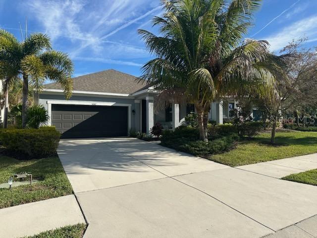 Welcome to this stunning modern home located at 5262 Asher Ct, Sarasota, FL. Built in 2018, this single-family home boasts a sleek and contemporary design with high-end finishes throughout. With 4 bedrooms, 3 bathrooms, an attached two car garage, and a spacious 2,307 sq.ft. of finished living space, this property located on street ending in a cul de sac offers plenty of room for comfortable living. Upon entering the home, you are greeted by an open-concept layout that is ideal for entertaining and everyday living. The main living area features high ceilings, large windows that allow for plenty of natural light, and stylish tile flooring. The gourmet kitchen is a chef's dream, with stainless steel appliances, quartz counter tops, and a large center island for meal prep and casual dining. The house is fully equipped with recently purchased upscale furnishings including but not limited to two elegant leather couches, a full office set, a grand dinning table, and four large, high quality flat screens. The master suite is a true retreat, with a spacious bedroom, walk-in closet, and a luxurious en-suite bathroom featuring a dual vanity, soaking tub, and separate shower. Outside, a covered lanai provides the perfect spot for al fresco dining or relaxing with a morning cup of coffee. The lanai presents an immaculately landscaped expansive back yard featuring native plants such as bougainvillea, banana trees, lady finger, sable, coconut, paurotis, and fan palms, as well as a high end privacy fence and underground irrigation system. The property sits on a sizable lot with a total of 7,822 sq.ft., offering plenty of outdoor space for gardening, playing, or simply enjoying the Florida sunshine.Located only 6 miles from the heart of downtown Sarasota and 4 miles from the famous Bobby Jones golf course this house is advantageously positioned to take advantage of Sarasota’s most desired beaches, restaurants, shopping and cultural attractions.Palmer Park HOA features 35 homes in a neighborhood located in a peaceful nook west of Honore Avenue just north of the western end of Palmer Boulevard. It is flanked north by the older, 255-home community of Cedar Hollow and south by Sunnyside Village, a senior Christian living community of some 200 residences off Bahia Street. The HOA services include lawn and shrub maintenance. Don't miss your chance to own this exquisite home in Sarasota, FL. Schedule a showing today and experience the beauty and elegance of 5262 Asher Ct for yourself.The parcel has recently been surveyed, a title commit completed, and an Estoppel Certificate performed.