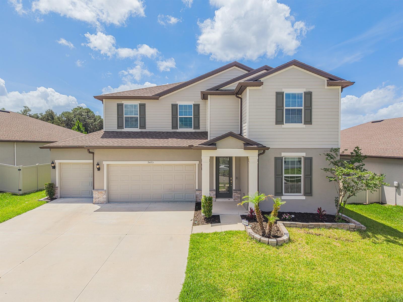 Welcome to 9475 Ibis Grove Blvd, a stunning newer-built Pulte “Sandhill” model located in the highly sought-after Epperson Lagoon community. This exceptional home offers the perfect blend of luxury, functionality, and breathtaking natural views. Featuring 4 spacious bedrooms, 4 full bathrooms, and a 3-car garage with premium epoxy flooring, this home is loaded with upgrades and designer touches throughout. High-end finishes, a water softener, newly enhanced landscaping, and an extended lanai create a home that is both elegant and comfortable.

Inside, you’ll immediately notice the incredibly spacious layout highlighted by a REALLY BIG living room perfect for entertaining, movie nights, or large family gatherings. The primary suite is equally impressive, featuring a REALLY BIG bedroom retreat with plenty of space for a sitting area, office nook, or private relaxation space.

What truly makes this property stand out is its incredibly rare backyard setting overlooking Eagle Park, King Lake, and a protected bald eagle nest preserved by the State of Florida — offering peaceful, scenic views that are nearly impossible to replicate. Enjoy relaxing mornings and unforgettable sunsets from your extended lanai while surrounded by nature and water views.

Living in Epperson means access to one of the most unique lifestyle communities in Florida, centered around the incredible 7-acre crystal-clear lagoon featuring kayaking, water slides, a sandy beach, swim-up bar, restaurant, obstacle course, and a venue hosting weekly events and entertainment. With resort-style amenities and a truly one-of-a-kind homesite, this property offers the ultimate Florida lifestyle experience.