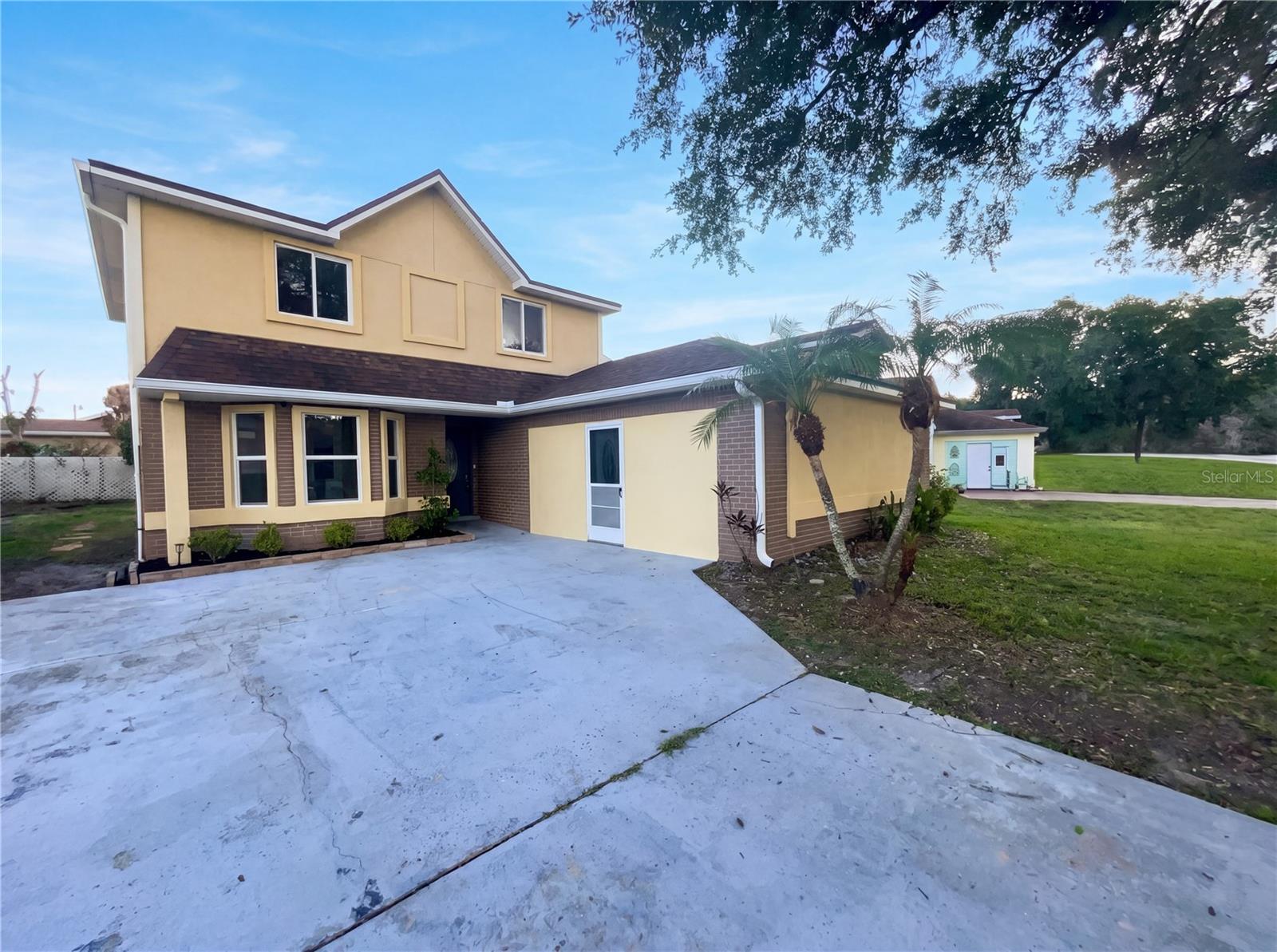 Discover 147 Coralwood Cir, recently refreshed with fresh interior paint and partial flooring replacement throughout. The kitchen contains all stainless steel appliances, complementing the primary bedroom's walk-in closet and the primary bathroom's double sinks. An exterior patio provides an additional functional space. This updated residence perfectly blends comfort and convenience for easy living. Included 100-Day Home Warranty with buyer activation. Garage has been converted to bonus living space; property has no garage.