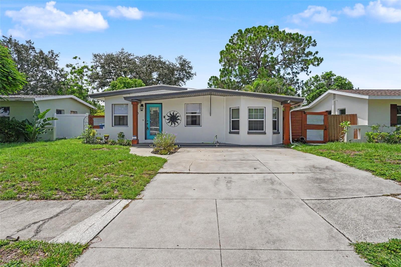 Step into your new POOL HOME in the heart of St. Petersburg! Centrally located with easy access to Tampa, Downtown St. Petersburg, and Florida’s beautiful beaches. Walking in, you’ll immediately notice the cohesive LUXURY VINYL FLOORING and FRESH PAINT throughout the home, guiding you from the living room to the spacious dining area. The kitchen is fully equipped with STAINLESS STEEL APPLIANCES, granite countertops, and an eat-in breakfast nook! Right off the kitchen is the laundry closet, boasting a Samsung stackable washer and dryer. The primary bedroom hosts an ABUNDANCE OF NATURAL LIGHT with large windows overlooking the backyard and pool. The bathroom has been RECENTLY RENOVATED with a stylish vanity, fixtures, and walk-in shower. Outside, you’ve got your own personal retreat - including the glimmering POOL, cozy FIREPIT, and fun TIKI HUT with plenty of built in bar stools and electricity! Perfect for hosting or enjoying some peace and quiet, this yard is everything you could dream of. Your mind will be at ease knowing this home DIDN'T FLOOD during any of the recents storms and all of the major upgrades have already been completed! The HVAC (2025), ELECTRICAL PANEL (2025), and POOL PUMP (2024) were RECENTLY REPLACED, so you can move in and immediately begin enjoying your new space. Located nearby to Gateway Plaza, all of your every day needs are right at your fingertips. Don’t miss out on this opportunity - schedule your showing today!
