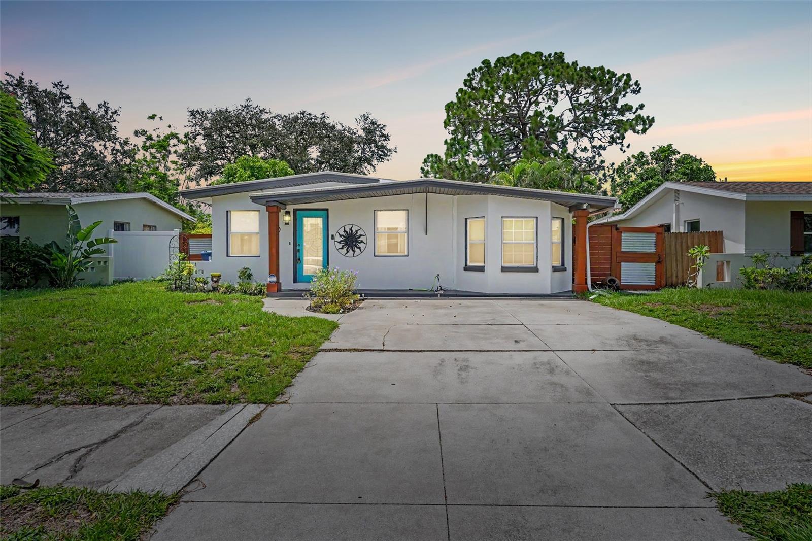 Step into your new POOL HOME in the heart of St. Petersburg! Centrally located with easy access to Tampa, Downtown St. Petersburg, and Florida’s beautiful beaches. Walking in, you’ll immediately notice the cohesive LUXURY VINYL FLOORING and FRESH PAINT throughout the home, guiding you from the living room to the spacious dining area. The kitchen is fully equipped with STAINLESS STEEL APPLIANCES, granite countertops, and an eat-in breakfast nook! Right off the kitchen is the laundry closet, boasting a Samsung stackable washer and dryer. The primary bedroom hosts an ABUNDANCE OF NATURAL LIGHT with large windows overlooking the backyard and pool. The bathroom has been RECENTLY RENOVATED with a stylish vanity, fixtures, and walk-in shower. Outside, you’ve got your own personal retreat - including the glimmering POOL, cozy FIREPIT, and fun TIKI HUT with plenty of built in bar stools and electricity! Perfect for hosting or enjoying some peace and quiet, this yard is everything you could dream of. Your mind will be at ease knowing this home DIDN'T FLOOD during any of the recents storms and all of the major upgrades have already been completed! The HVAC (2025), ELECTRICAL PANEL (2025), and POOL PUMP (2024) were RECENTLY REPLACED, so you can move in and immediately begin enjoying your new space. Located nearby to Gateway Plaza, all of your every day needs are right at your fingertips. Don’t miss out on this opportunity - schedule your showing today!