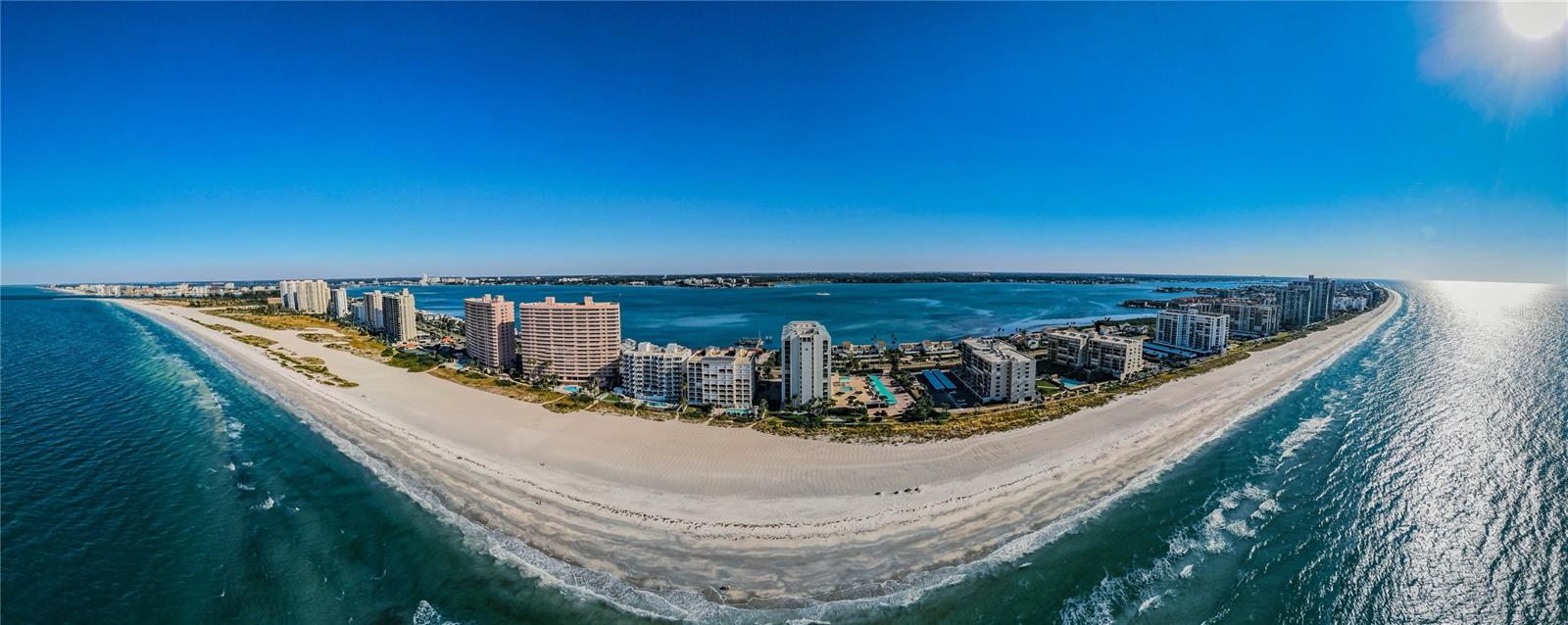 AVAILABLE NOW. SPACIOUS 11TH Floor EXPANSIVE AND DIRECT GULF FRONT VIEWS from CORNER CONDO RECENTLY REMODELED FLOOR TO CEILING and WALL to WALL. Custom Kitchen with Granite Counter Tops, Wood Cabinets TOTALLY NEW Bathrooms with newly Tiled Floors. Master Bedroom and Living Rooms and Florida Room feature Glass Sliders that open and let in the Sea Breezes and and sounds of the soothing waves against the shore. Spacious and Open Areas from Kitchen throughout the roomy Living Spaces. On the Juliet balconies you can capture the Gulf breezes wafting over the surf and flowing into your new condo. Sand Key Club features: Elevated Pool Deck complete with Cabanas, Spa, Shuffleboard, and Putting Green. Lobby has 24/7 Attendant features Social Area Fitness Room, Sauna, Club Room w/Kitchen. Rent for the Fall. 3 Months.
