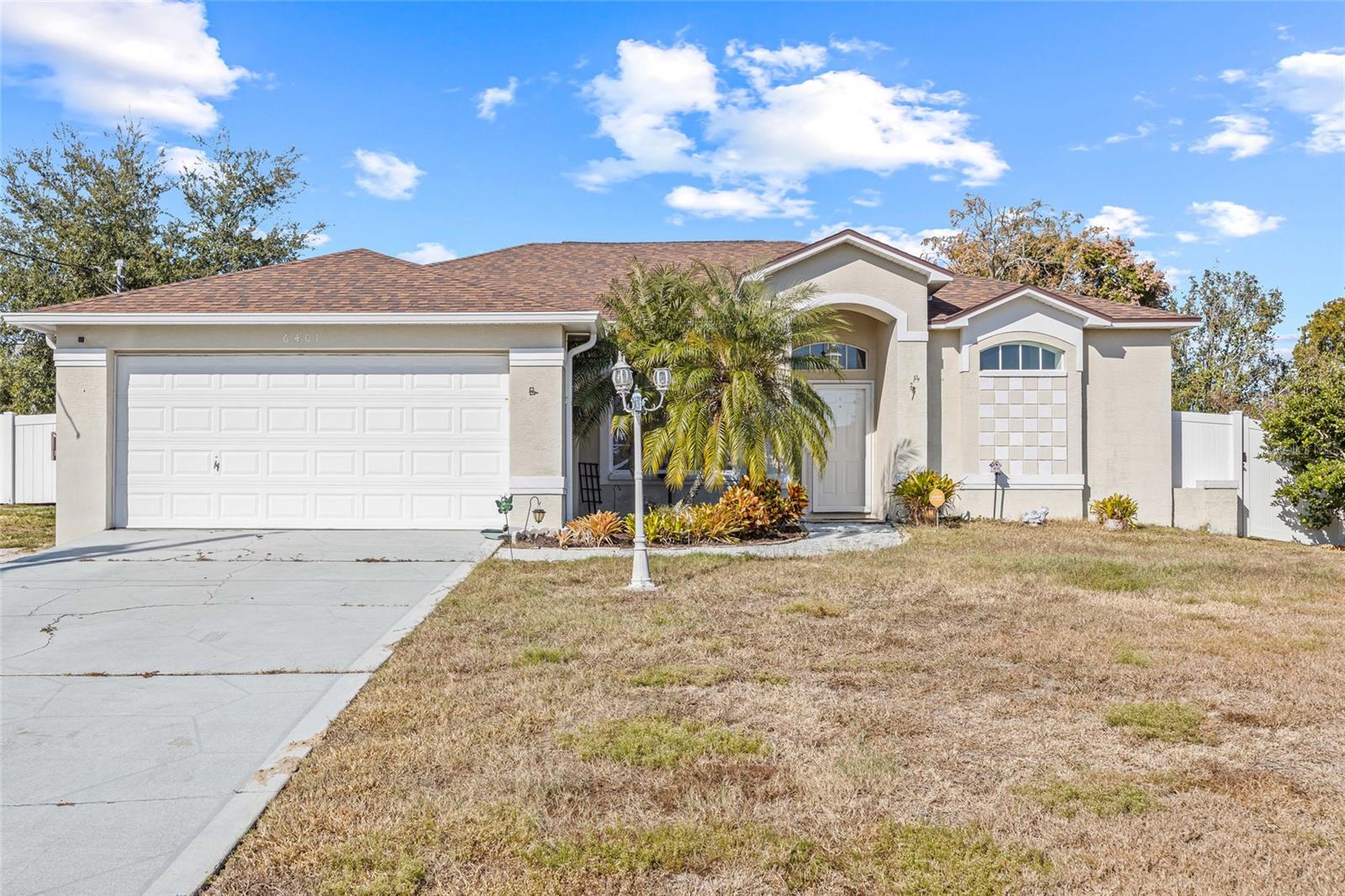 Welcome to 6401 Grapewood Rd, a beautifully maintained 3-bedroom, 2-bathroom, 2-car garage pool home offering just under 1,500 square feet of comfortable living space and a fantastic split-bedroom floor plan. From the moment you walk inside, you'll appreciate the open and inviting layout. The spacious living room and beautifully updated kitchen serve as the heart of the home, with both spaces overlooking the sparkling pool area—creating the perfect setting for everyday living and entertaining. Whether you're preparing dinner, enjoying your morning coffee, or hosting guests, you'll love the views and natural light this home provides. The split-bedroom design offers privacy for both owners and guests, with the primary suite tucked away from the secondary bedrooms. Step outside and discover your own backyard retreat featuring a screened pool and an additional outdoor deck area that's perfect for grilling, relaxing, and gathering with family and friends. Major updates provide peace of mind, including a roof replaced in 2020 and a new A/C installed in 2026. The fully fenced backyard offers privacy and plenty of room for pets and outdoor activities. Conveniently located near shopping, restaurants, medical facilities, schools, and the Suncoast Parkway, this home combines comfort, functionality, and an ideal location.
If you've been searching for an affordable pool home with updates already completed, this one deserves a spot at the top of your list!