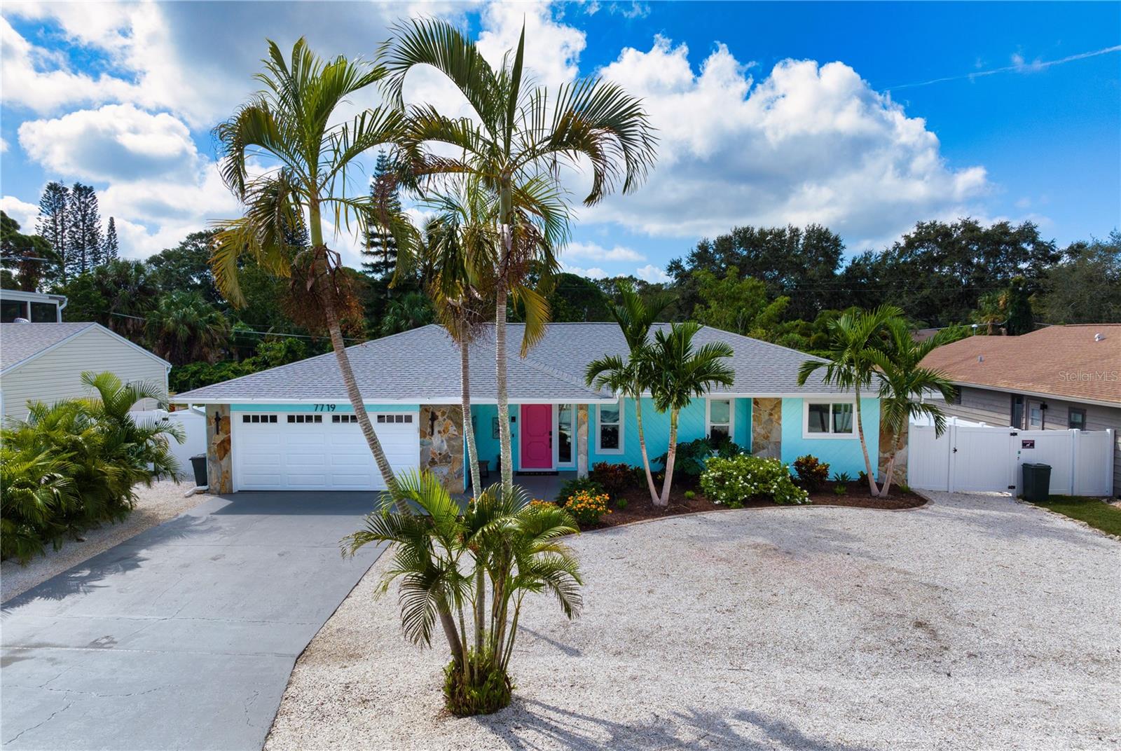 Welcome to, a one-of-a-kind coastal retreat offering the perfect blend of luxury, entertainment, and Florida lifestyle living just minutes from the world-famous beaches of Anna Maria Island. This beautifully designed 3-bedroom, 2-bath home is packed with upgrades and incredible indoor-outdoor living spaces, making it ideal as a primary residence, second home, or investment property.

Step inside to discover a vibrant, coastal-inspired interior filled with custom murals, tropical accents, stylish finishes, and spacious living areas designed for both relaxation and entertaining. The open-concept floorplan features multiple gathering spaces, including a comfortable living room, dining area, and a separate game room complete with views overlooking the backyard oasis.

The kitchen is fully equipped with stainless steel appliances, beautiful countertops, and ample storage, making it perfect for hosting family and friends. The split-bedroom floorplan offers added privacy, with a spacious primary suite featuring a King bed setup, ensuite bathroom and large walk-in closet. Two additional guest bedrooms provide plenty of room for visitors and larger families.

Step outside into your own private backyard retreat featuring a fully fenced yard designed for both relaxation and entertaining. The screened-in heated pool provides the perfect place to enjoy Florida living year-round, while the hot tub is ideally positioned just outside near the tiki bar and extended deck area, creating a true tropical atmosphere. With multiple outdoor seating and entertaining spaces, this backyard offers the perfect setting for hosting guests, enjoying peaceful evenings, or soaking up the Florida sunshine in complete privacy.
Located in a highly desirable Bradenton location, this house offers easy access to Anna Maria Island beaches, Robinson Preserve, IMG Academy, local parks, boat ramps, golf courses, shopping, dining, and the historic fishing village of Cortez. Whether you enjoy boating, kayaking, biking, fishing, or simply relaxing poolside, this home places you close to everything!

With its exceptional amenities, prime location, and unforgettable design, this house presents a rare opportunity to own a true Florida house with excellent full-time living, vacation home, or income-producing potential.
