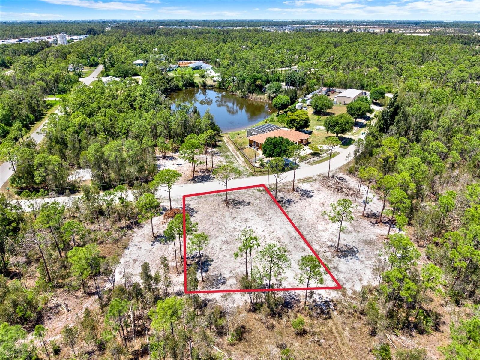 This oversized 0.32-acre residential lot offers a peaceful wooded setting with plenty of space for your custom home, investment property, or seasonal retreat.

Conveniently located between Punta Gorda and Fort Myers, this property provides easy access to I-75, Burnt Store Marina, golf courses, boating, world-class fishing, shopping, dining, and beautiful Gulf Coast beaches. Enjoy the natural beauty of nearby Charlotte Harbor Preserve State Park and the Charlotte Harbor Environmental Center with miles of scenic hiking and nature trails just minutes away.

With no HOA fees and no deed restrictions, you’ll have the flexibility to create the lifestyle you’ve been looking for. Surrounded by new construction and future growth, this lot is an excellent opportunity to invest in one of Southwest Florida’s up-and-coming communities while enjoying the peace and privacy of a serene natural setting.