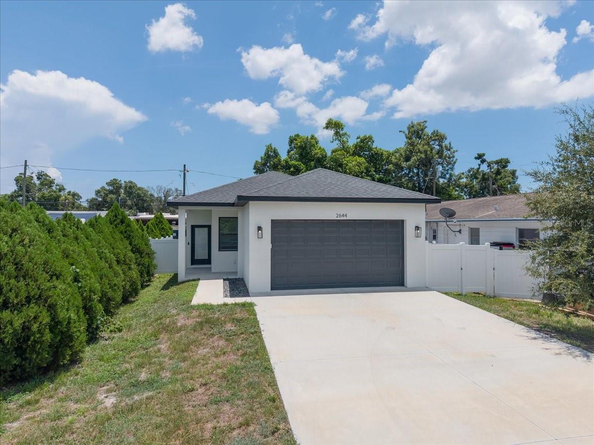 Why buy an older home when you can own newer construction?

Built by Davis Development in 2023, this all-block home offers the peace of mind, energy efficiency, and modern finishes that are hard to find at this price point in St. Petersburg.

The 4 bedroom, 2 bath (1,596 sf) open floor plan is designed for everyday living, with high ceilings, luxury vinyl flooring, and a spacious kitchen featuring stainless steel appliances, plenty of cabinet space, and a large island that opens to the living and dining areas. The split-bedroom layout offers privacy, with a comfortable primary suite featuring a walk-in closet and en-suite bath.

Out back, you'll find a covered patio and a fully fenced yard, perfect for pets, kids, or entertaining friends. The attached two-car garage even includes an EV charger.

If you've been shopping in this price range, you know how rare it is to find newer construction, especially an all-block home built by one of St. Petersburg's most respected local builders. Instead of taking on the projects and surprises that often come with older homes, you can move right in and start enjoying everything a newer home has to offer.

Located just minutes from downtown St. Petersburg, I-275, shopping, restaurants, and the beaches, this home offers an incredible combination of quality, convenience, and value.