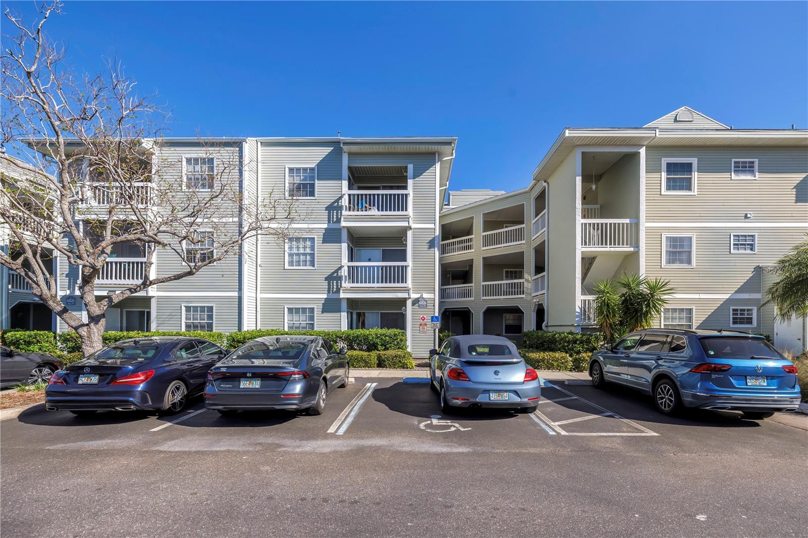 Exquisitely Updated Condo in the Heart of St. Petersburg’s Tyrone Area! Prepare to be impressed by this stunningly renovated ground-floor 1-bedroom, 1-bathroom condo that perfectly blends modern luxury with everyday comfort. From the moment you walk in, you’ll be captivated by the bright, open-concept living space that flows seamlessly to your back patio—an inviting retreat to relax and unwind. The gourmet kitchen is a showstopper, boasting quartz countertops, a designer tile, and gleaming stainless steel appliances that make both cooking and entertaining a joy. The bathroom is equally stylish, featuring a spa-like ambiance with a sleek vanity, chic backlit mirror, and a bathtub for soaking away the day. Additional highlights include a new roof in 2025, an AC system installed just 2 years ago, a full-size washer and dryer, and one reserved parking spot with ample guest parking available. The community itself is highly desirable, offering resort-style amenities including a heated spa, lap pool, updated tennis/pickleball courts, outdoor grills, a community room, and beautifully landscaped grounds. Scenic walking paths and charming wooden bridges wind around the tranquil waterways, offering a peaceful escape just steps from your front door. With low condo fees that cover cable, internet, water, sewer, trash, exterior maintenance, landscaping, and pest control, plus a pet-friendly, non-age-restricted environment, this property truly has it all. The unbeatable location puts you just minutes from Gulf beaches, Publix, Tyrone Mall, top dining, and vibrant downtown St. Pete—with the Pinellas Trail less than 100 yards away for biking and outdoor adventures. Don’t miss this opportunity to own an exquisitely updated condo in one of St. Pete’s most convenient locations. Schedule your private showing today!