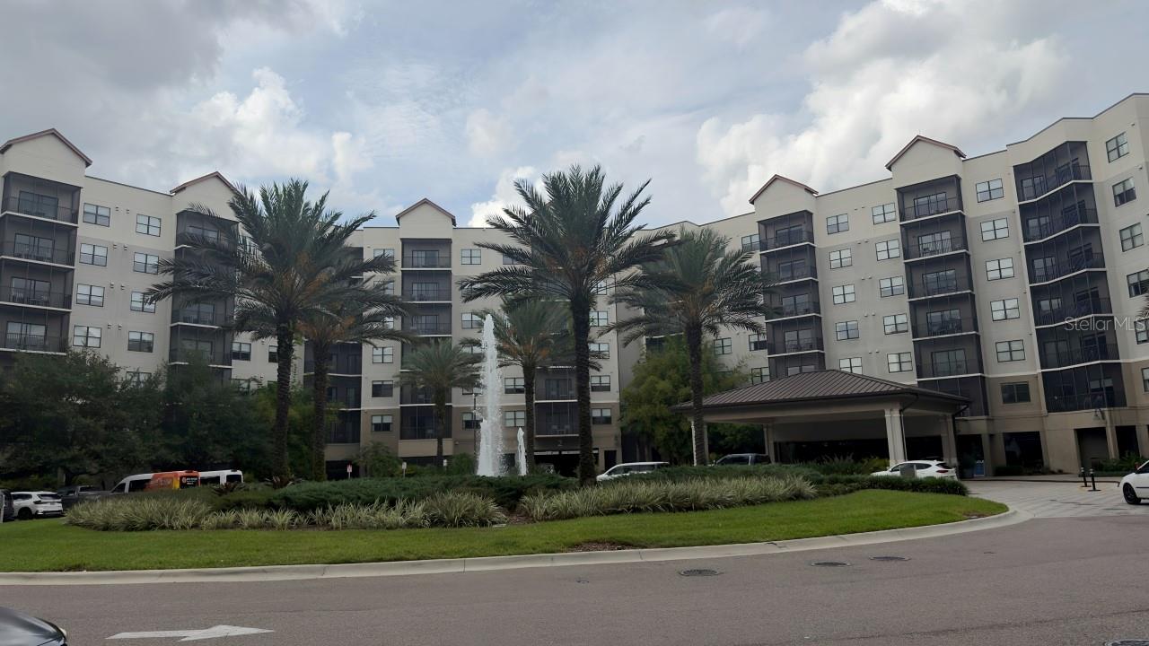 Experience the ultimate vacation lifestyle and investment opportunity at Grove Resort & Spa Orlando! This beautifully appointed 2-bedroom, 2-bath condo-hotel offers approximately 1,265 square feet of thoughtfully designed living space with an open-concept layout, stone countertops, stainless steel appliances, walk-in closet, in-unit laundry, private balcony, and elevator access. Fully furnished and turnkey, this residence is ideal as a personal vacation retreat or income-producing property within one of Central Florida's premier resort destinations. Owners and guests enjoy world-class amenities including Surfari Water Park with FlowRider® surf simulator, lazy river, multiple resort pools, private cabanas, waterslides, fitness center, full-service spa, lake activities on Lake Austin, on-site restaurants and bars, arcade, concierge services, 24-hour gated security, and complimentary transportation to Walt Disney World®. Located just minutes from Disney, Flamingo Crossings, shopping, dining, golf, and Orlando's world-famous attractions, this exceptional resort property delivers the perfect blend of luxury, convenience, and unforgettable Florida living.