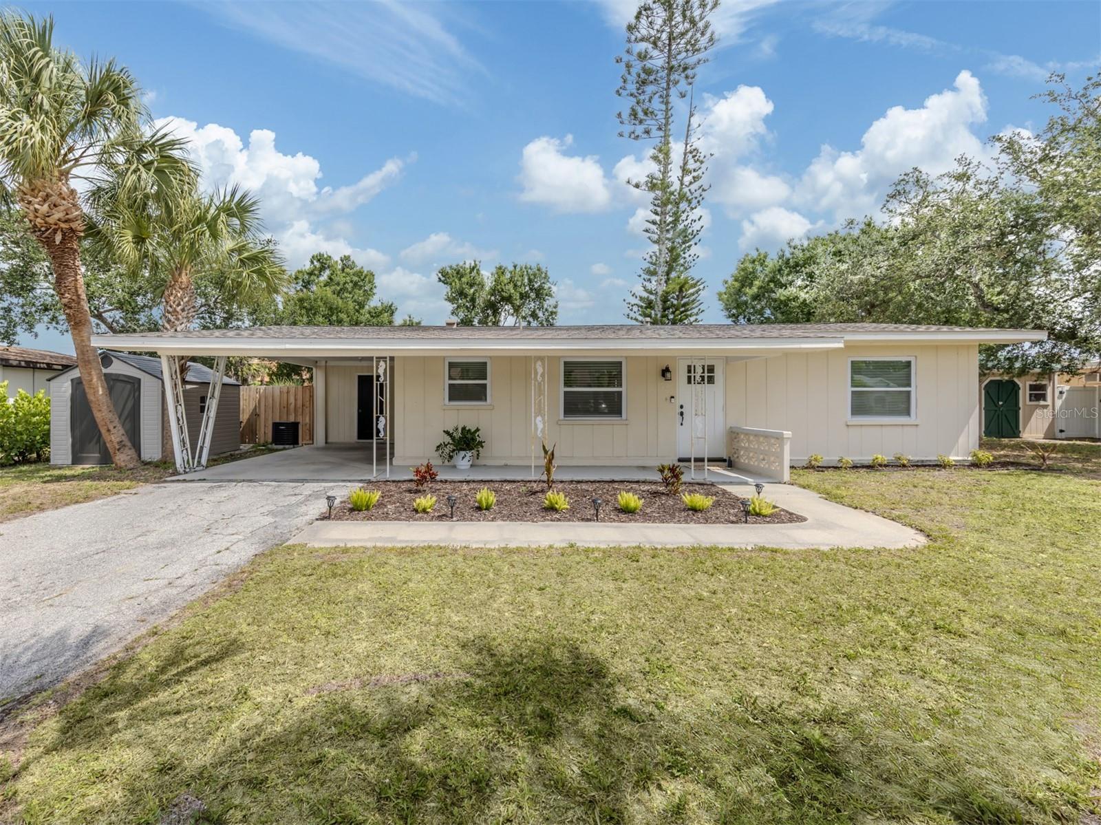 BACK ON THE MARKET! Due to previous financing fallout. LOCATION! 2 miles from the beach and historic downtown Venice! Where all your favorite shops and restaurants awaits you! NEWER ROOF, AC, plumbing, and electrical! NO HOA FEE. New upgrades have been added to elevate the living including BRAND NEW pavers placed in the backyard, full privacy fence perfect for families and dogs, new shed, new sod, and all new exterior doors!  With hurricane impact windows throughout, except for the Florida room, you can enjoy a peace of mind while embracing coastal living. The open floor plan features tile flooring, and a beautifully updated kitchen with inviting butcher block counters.
The spacious backyard offers plenty of room for outdoor gatherings or relaxing in the surl. Pet owners dream! Completely fenced in backyard so your dog can play out in the yard stress free! After a day at the beach, explore the nightlife that downtown has to offer. This property could be your future vacation home, or an amazing investment opportunity! Ready to create lasting memories in the heart of Venice!