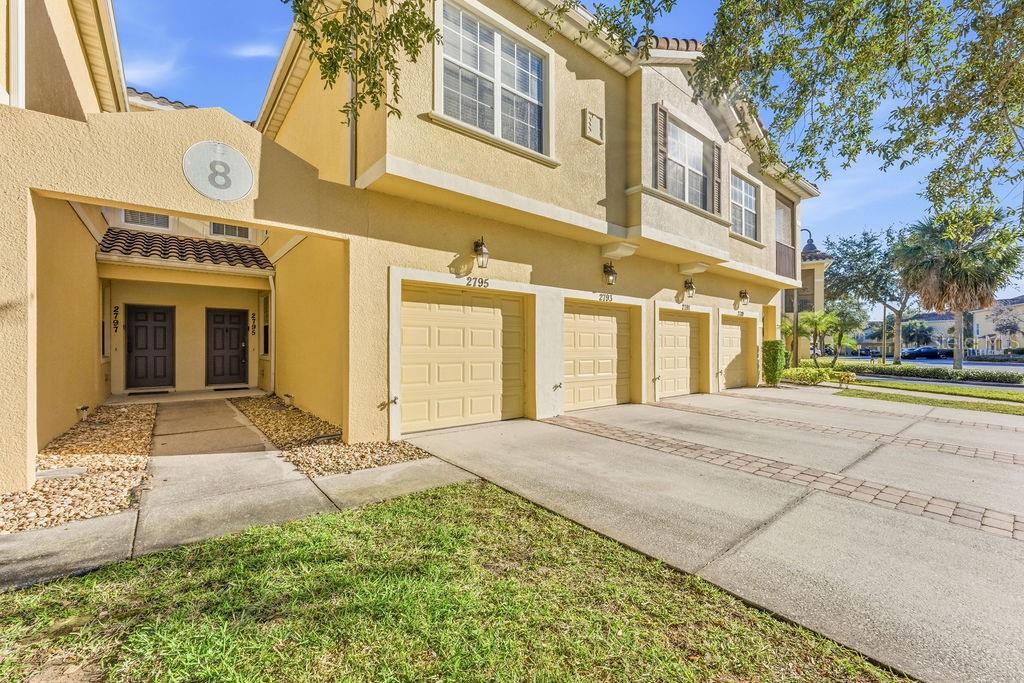 Beautifully updated 3-bedrooms, 2.5-bathrooms Move-In ready townhouse in a Gated Resort-Style community just 10 minutes from Walt Disney World. Zoned for highly rated schools and ideally located near US-192, Celebration, I-4, 417, and 429, offering exceptional convenience.

This home features luxury vinyl plank flooring throughout, fresh interior paint, and a modern kitchen with quartz countertops. The open-concept layout is bright and functional, ideal for both everyday living and entertaining. Enjoy peaceful Water views with NO rear neighbors, providing added privacy and tranquility.

Rent includes Cable, Internet, Water, and landscaping for low-maintenance living. Community amenities include a Clubhouse, resort-style Pool and spa, Fitness center, Splash Pad, Playground, Walking trails, Game room, and Sports courts including Tennis, Basketball, Pickleball, and Volleyball.

Conveniently located near US-192 with Walmart, Starbucks, dining, shopping, and entertainment just steps away. Quick access to Celebration, major theme parks, I-4, 417, and 429.

Available for immediate move-in—schedule your private showing today.