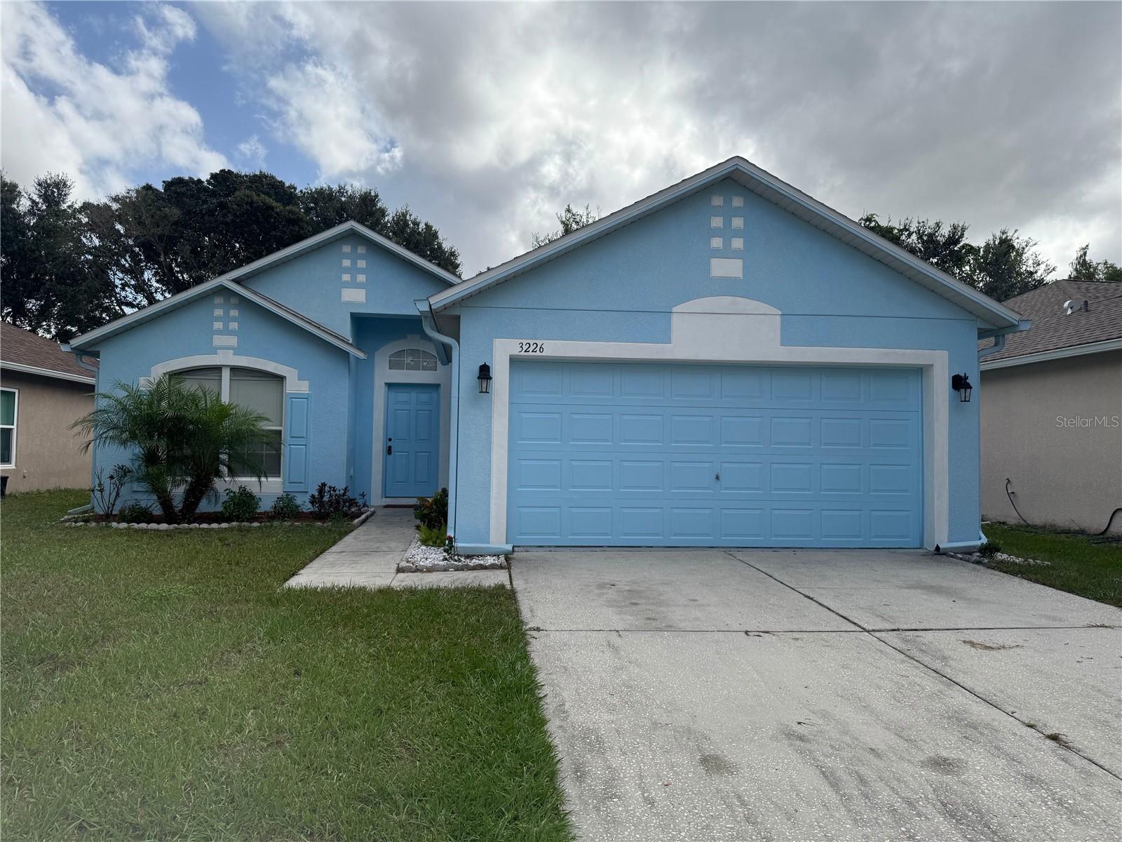 This beautifully updated 3 bedroom,
2 bathroom home is located in the heart of Land O Lakes, FL. Freshly painted throughout, this spacious home offers a bright and inviting atmosphere from the moment you walk in. The kitchen has been thoughtfully updated with modern appliances, beautiful quartz countertops, and ample cabinet space perfect for cooking and entertaining. The open living and dining areas provide plenty of natural light, creating a warm and comfortable space for relaxing or hosting guests. The primary suite features its own updated en-suite bathroom and generous closet space, while the two additional bedrooms offer flexibility for family, guests, or a home office. Both bathrooms have been tastefully renovated with contemporary finishes. Outside, you'll find a private backyard that's perfect for enjoying Florida's sunshine, along with an attached garage and driveway for easy parking. This home is just minutes from top rated schools, parks, shopping, dining, and offers easy access to I-75, SR-54, and US-41. Don't miss this opportunity to rent a stylish, move-in ready home. Call today to schedule a showing! Hurry...won't last long!  Outside of home being painted before move in