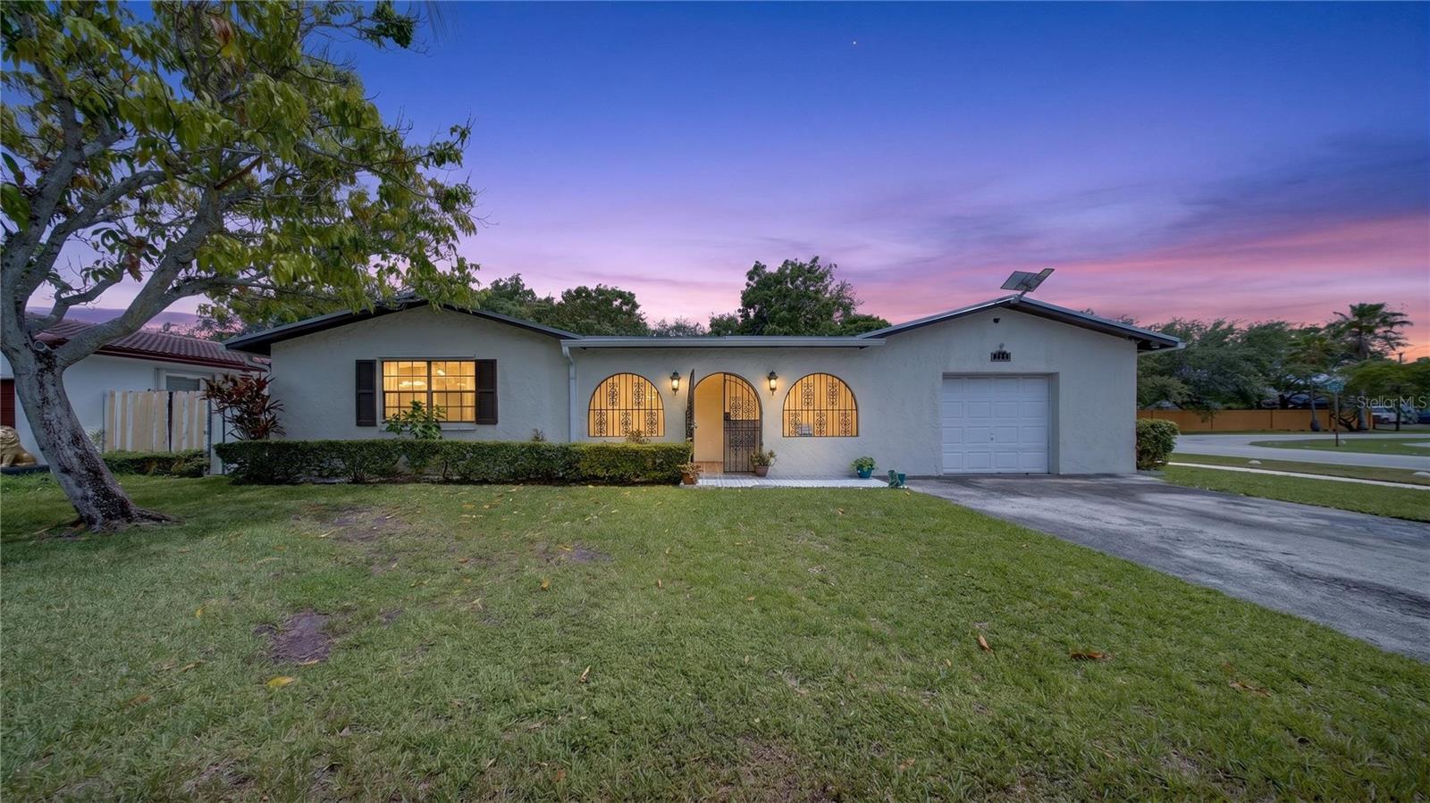 Discover your dream Florida Lifestyle in this lovely Miami Florida home! Escape to sunny South Florida and make this charming 3-bedroom, 2-bathroom single-family home your perfect new beginning. Nestled on a spacious 8,000 sq ft corner lot in the highly desirable Southland Pines neighborhood, this 1,901 sq ft residence offers the ideal blend of comfort, tasteful updates, and endless potential for new homeowners, down-sizers or out-of-state buyers seeking sunshine, tax savings, and an authentic Miami lifestyle. Built in 1973 with durable block construction, the home features a modern kitchen with granite countertops and stainless steel appliances, energy-efficient LED lighting throughout, and a 2015 roof for years of worry-free living. Inside, you’ll love the open living spaces accented with a mix of ceramic tile and wood flooring, generous bedrooms with walk-in closets, a convenient pantry, washer and dryer included, and central air conditioning. Step outside to your private fenced yard, complete with covered patio, fruit trees and plenty of room to add a sparkling pool or create an outdoor entertainment area, or simply relax under the Florida sun. The attached 1-car garage and extended driveway allow ample parking, with extra space for an RV or boat—perfect for spontaneous adventures to the Keys or coastal getaways. Out-of-state buyers will appreciate this prime location, just a 35-45 minute drive to the iconic sands and vibrant energy of Miami Beach and South Beach. You’re also minutes from major highways, shopping destinations, top-rated schools, parks, and easy access to Downtown Miami, world-class dining, cultural hotspots, and endless outdoor recreation. With Florida’s famous no state income tax advantage, more of your hard-earned money stays in your pocket to enjoy paradise. Whether you’re relocating for retirement, family adventures, or smart investment, this versatile home in an established community gives you room to grow, personalize, and truly thrive in the Florida dream. Don’t miss your chance—schedule a private showing today and start living the sun-soaked lifestyle you’ve always imagined!