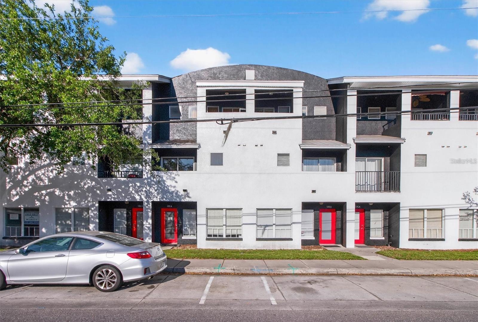 This mixed-use property features two separately accessed units (A & B) with a new roof replaced in 2025. It offers flexibility for both business and residential use.Unit A (First Floor) consists of approximately 800 SF and is configured as a two-office suite with a handicap-accessible restroom. It includes a private front entrance and convenient street parking along Bumby Ave, making it ideal for professional or service-based businesses. Unit B (Second & Third Floors) is a 1,400 SF, two-story residential townhome with a private rear entrance adjacent to the garage. The second floor serves as the main living area, featuring an open-concept layout with abundant natural light. The living, dining, and kitchen areas flow seamlessly, creating an inviting space for everyday living or entertaining. The kitchen is equipped with granite countertops, ample cabinetry, and generous workspace. This level also includes a half bath, in-unit washer and dryer, garage access, and a private lanai. The third floor offers a dual-primary suite layout, with two spacious bedrooms positioned on opposite sides for maximum privacy. Each suite includes a walk-in closet and en-suite bathroom, ideal for roommates, guests, or flexible living arrangements. A private rooftop terrace provides additional outdoor space, perfect for entertaining or relaxation. Zoned for mixed use (Residential + Office), the property supports multiple strategies: owner-occupant use, live/work configuration, or full investment with dual rental income streams. Located in the highly sought-after Milk District, just minutes from Downtown Orlando, dining, retail, and entertainment. A rare opportunity to acquire a versatile, income-producing property in one of Orlando’s most dynamic corridors. Don't miss this opportunity! Schedule your private showing today!