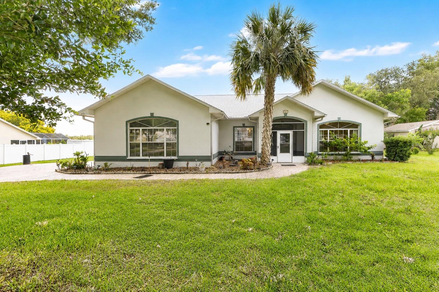 Situated on a full 1-acre lot in the Hilliard Place community, this 4-bedroom, 3-bath pool home offers the perfect blend of space, privacy, and convenience in a sought-after Kissimmee location. Tucked away on a quiet cul-de-sac, the property welcomes you with an extended driveway, generous outdoor space, and a setting that feels private while still being close to everything Central Florida has to offer.

As you enter the home, you're greeted by a formal dining area to the left that connects seamlessly to the kitchen, while an additional flex space to the right provides endless possibilities as a second living area, home office, playroom, or hobby space. The layout then opens into the heart of the home, where natural light fills the main living areas and creates a bright, inviting atmosphere throughout.

The spacious kitchen is designed for both everyday living and entertaining, featuring matching built-in appliances, a cooktop, abundant cabinetry, extensive counter space, a center island, and a convenient breakfast bar that overlooks and connects to the main living room, creating the perfect space for casual dining and gathering. The open design makes it easy to stay connected whether you're preparing meals, hosting guests, or enjoying time with family.

The thoughtfully designed split-bedroom floor plan provides added privacy, with the primary suite situated on one side of the home and the remaining bedrooms on the opposite side. The spacious primary retreat features a large ensuite bathroom complete with dual vanities, a garden tub, separate shower, and ample storage. The additional bedrooms are generously sized and offer a similar feel and functionality.

Step outside to enjoy Florida living at its finest with a screened-in heated saltwater pool reaching approximately 8 feet in depth, perfect for relaxing, entertaining, or cooling off on warm Florida days. One of the secondary bathrooms also serves as a convenient pool bath, making outdoor gatherings even more enjoyable. The covered lanai overlooks a spacious backyard with plenty of room to spread out and enjoy the outdoors.

One of the standout features of this property is the generous distance between neighboring homes, offering a level of privacy that is increasingly difficult to find. The fully usable acre provides endless possibilities for outdoor activities, gardening, future additions, workshops, or simply enjoying the extra space and peaceful surroundings. The property also features an existing chicken coop, adding character and functionality for those who enjoy raising chickens or creating their own backyard homestead. For added peace of mind, the home is equipped with hurricane shutters for every opening, helping provide protection and preparedness during storm season.

Located within a small, established community known for its friendly neighbors and welcoming atmosphere, you'll enjoy the perfect balance of privacy and community. Conveniently located near Boggy Creek Road, Lake Nona, Medical City, Orlando International Airport, major highways, shopping, dining, and everyday conveniences, this property offers the opportunity to enjoy peaceful living without sacrificing accessibility. Whether you're looking for room to spread out, a private pool home, or the rare combination of acreage and convenience, this property is one you won't want to miss.