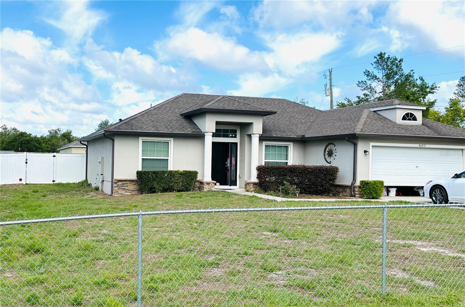 PRICE ADJUSTMENT! NO HOA!   Beautifully maintained 3 bedroom, 2 Bathroom home with Split Floorplan and Open Layout. Light, Bright, and Welcoming! Located near North Lake Park, shopping, Umatilla airport, Chain of Lakes, and Ocala National Park which offers a wide variety of  outdoor activities. Screened Porch looks out over a 107 x 115 SQFT, fenced in yard with plenty of room for entertaining or family activities! Come see if this is the home for you!