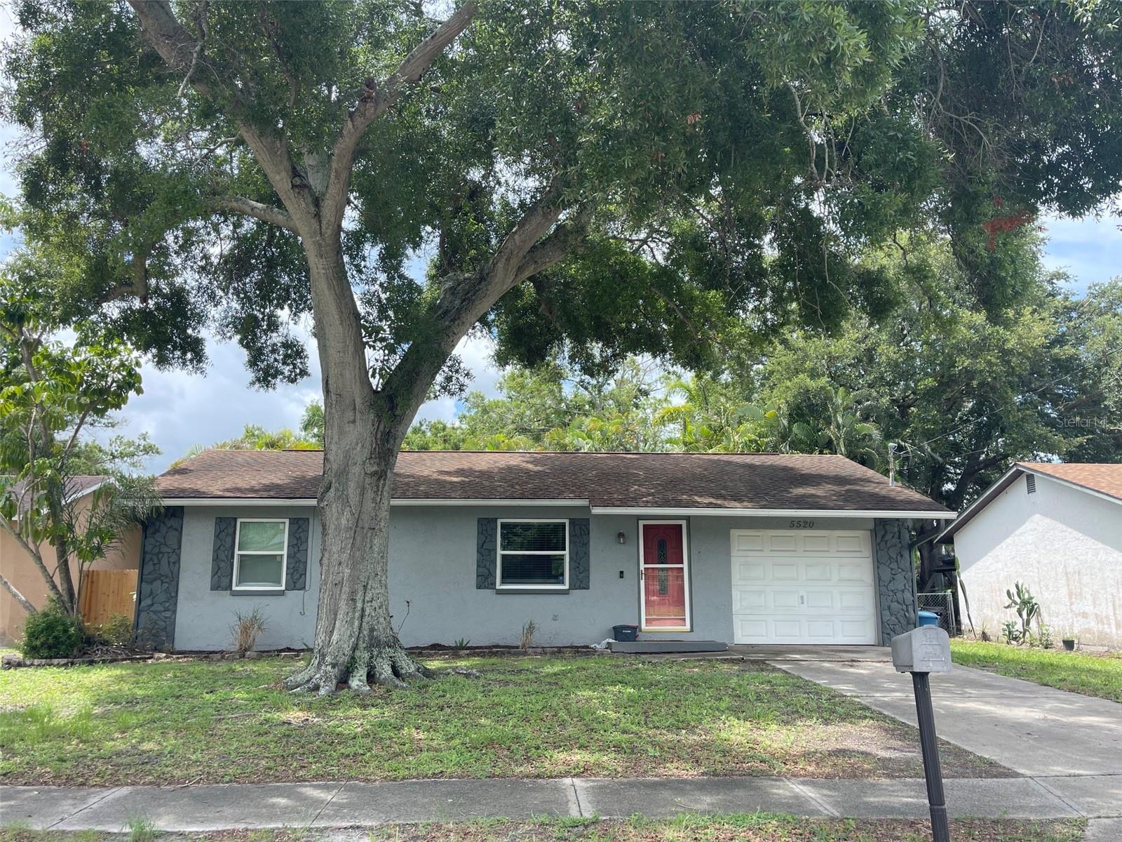 MUST SEE! NEW ROOF (2026) INSTALLED before closing ** Hurricane Windows (2021), Water Heater (2021) HVAC (2019) Popcorn Ceilings removed! SPLIT FLOOR PLAN! NEW LIGHT FIXTURES THROUGHOUT! New Flooring throughout (2023) Crown Molding * GOT PETS? AMAZING Fenced Yard with ARECA Palms & TWO SHEDS for storage. ** OPEN FLOOR PLAN with Split floor plan for bedrooms, Fabulous Kitchen with nice wood cabinetry and some newer appliances! ** Pantry and Laundry Room, off kitchen, making this home very functional. HURRICANE WINDOWS make for a sound proof and BRIGHT presence! This spacious and inviting home is SURE TO PLEASE!  NON FLOOD ZONE! Never any Water!