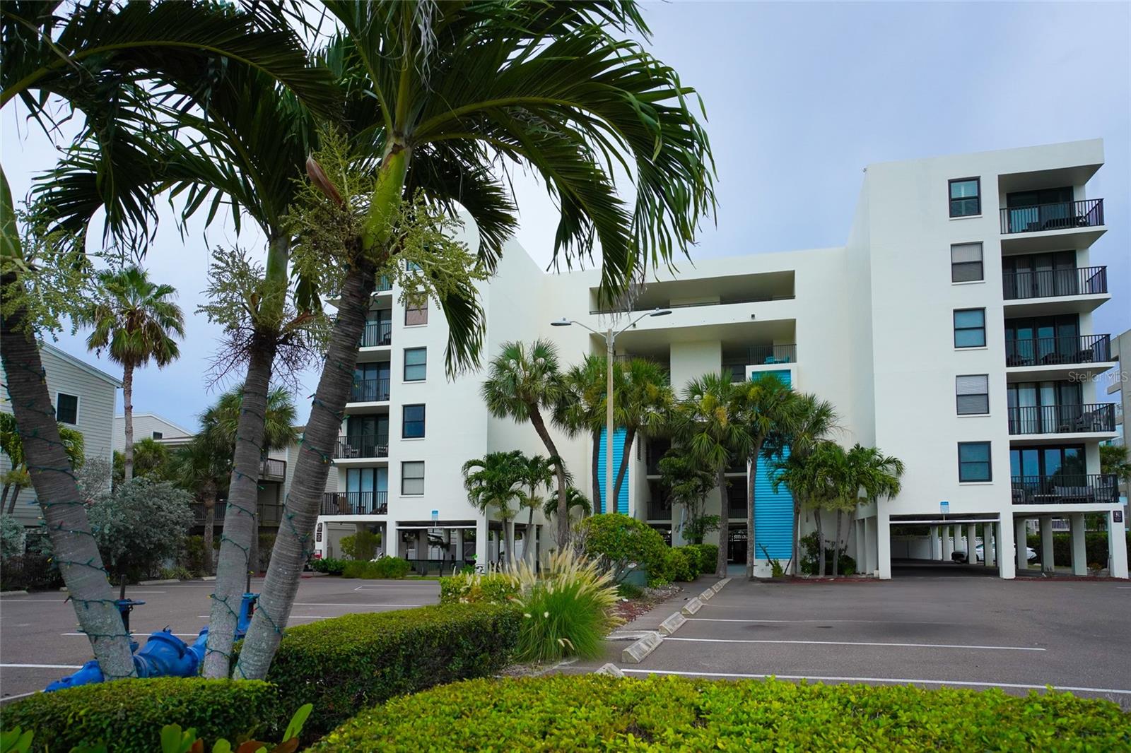 Turnkey Beachside Condo with Intracoastal Views – 1-Week Minimum Rentals Allowed Just one block from the beach, this beautifully maintained 2-bedroom, 2-bathroom condo offers the perfect blend of coastal living and rental income potential. Sold fully furnished and turnkey, it’s ready for immediate enjoyment or vacation rental use. Step inside to a light-filled, open-concept living space and updated kitchen, perfect for relaxing or entertaining. The primary suite includes a private ensuite bathroom, and both bedrooms are spacious with ample storage. Enjoy your morning coffee or evening cocktails from the private balcony overlooking the Intracoastal Waterway—a peaceful retreat just steps from the sand. With a 1-week minimum rental policy, this condo is ideal as a personal getaway, full-time residence, or income-producing property. Close to beach access, restaurants, and local shops, this is your chance to own a piece of paradise in Indian Shores. The building underwent a major refurbishment in 2023, including resurfaced balconies with brand-new railings, updated flooring throughout the hallways, and refreshed pool and patio areas with new paint and surfacing. In 2024, the roof was completely replaced for added peace of mind. This particular unit also features upgraded storm-resistant windows and doors for enhanced durability and protection.