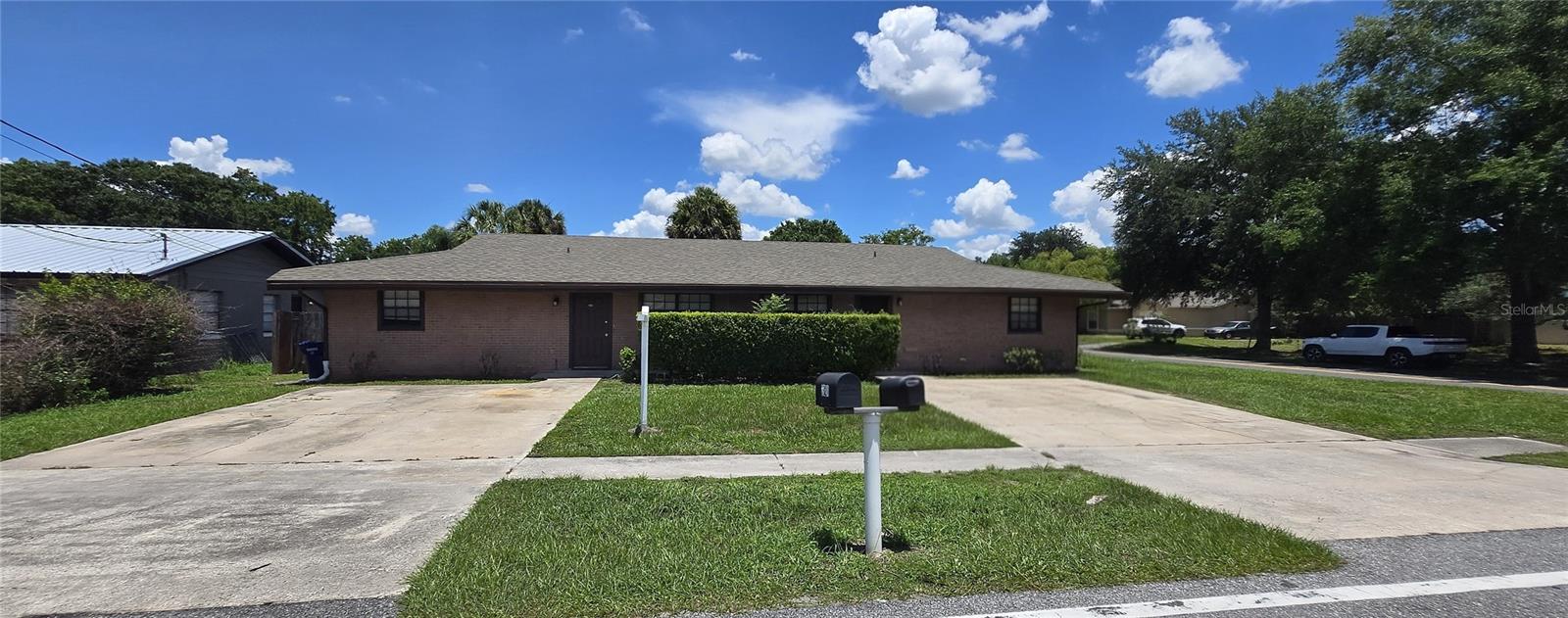 Income-Producing Duplex on Corner Lot – No HOA! Exceptional opportunity in Winter Haven! This well-maintained duplex at 2021/2023 Buckeye Rd NE features two spacious 2-bedroom, 2-bathroom units — 1,070 sq ft each — both with the convenience of indoor laundry hookup. Unit 2021 is vacant and move-in ready, while Unit 2023 is occupied by a reliable tenant who just renewed their lease at $1,300/month for another full year — instant income from day one! With market rents for comparable renovated units ranging from $1,400–$1,500, there's built-in upside on both sides. Perfect for the savvy house hacker: live in one unit while your tenant covers a significant portion of your mortgage. Investors will love the turnkey setup — lease the vacant unit at market rate and enjoy strong dual rental income with room to grow. Situated on a desirable fenced corner lot with no HOA fees or restrictions. Roof replaced in 2018, keeping maintenance minimal and insurance affordable. Opportunities like this — generously sized units, in-place income, and rent upside — don't last long. Schedule your showing today!