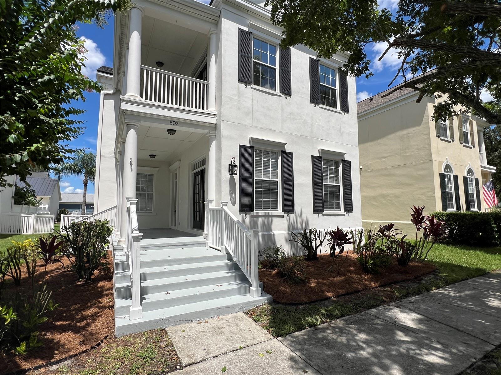 Immaculate, popular Charleston side row style home with formal living and dining rooms featuring crown molding and wood floors; kitchen amenities include pantry as well as an eat-in area. Oversized secondary bedroom with access to outdoor and floor balcony. Bonus room and great room provide lots of space for family entertainment. Enjoy evenings on the front porch or the rear, screened patio fenced yard for privacy. Great location across from Celebration's A-rated K-8 school and just steps to downtown restaurants, shops, walking trails, pool, and more!