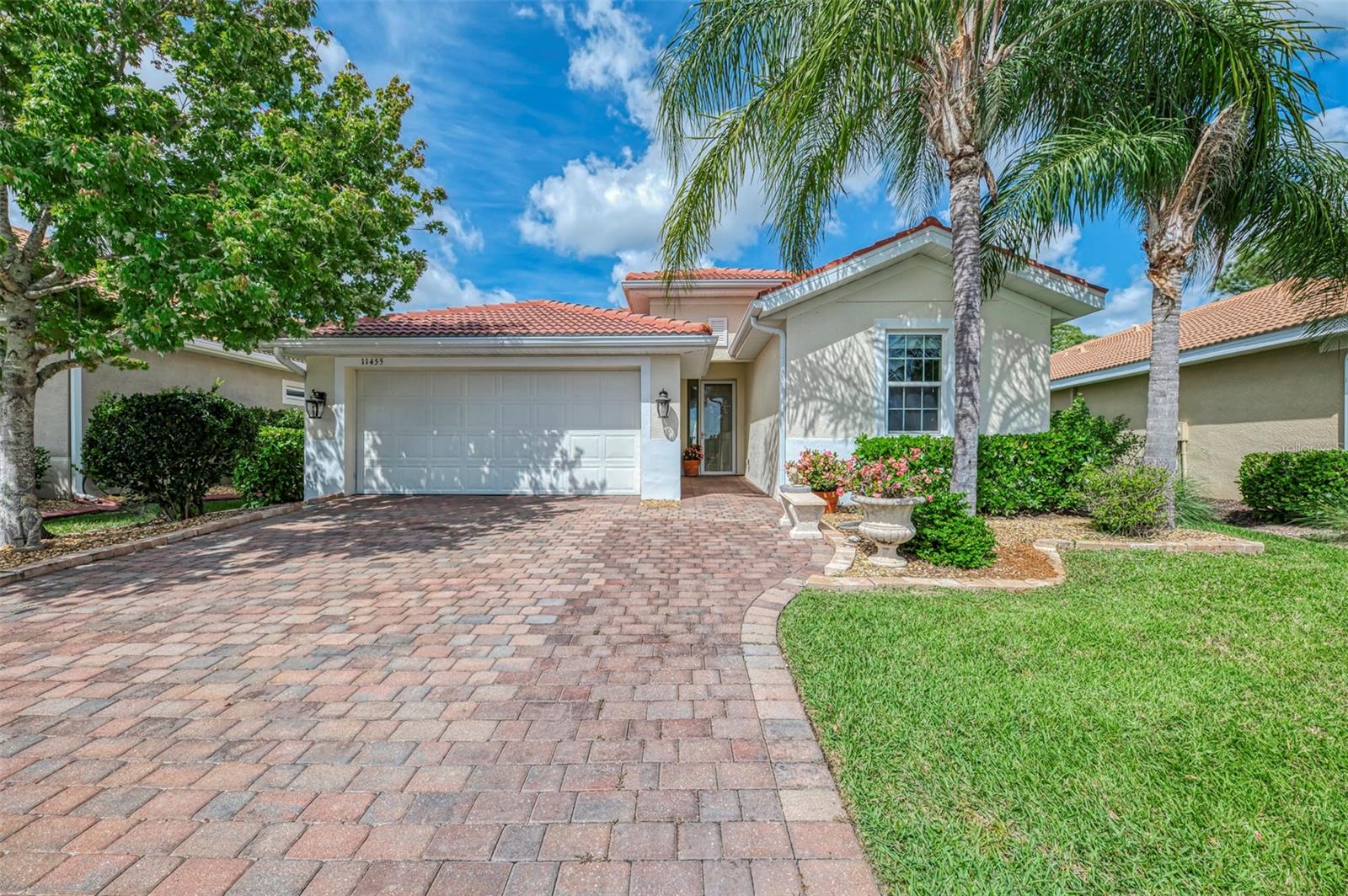 Welcome to your slice of paradise in Caribbean Village! Seller has an assumable 2.25% VA mortgage (do not need to be a veteran to qualify).  This beautifully maintained turnkey furnished 3-bedroom, 2-bath home with a 2-car garage offers comfort, style, and an unbeatable location within the community.

Situated on a quiet cul-de-sac with no road noise, this property is considered one of the best locations in the neighborhood. Step outside to your private backyard oasis featuring a custom pool added in 2021, complete with both an owned solar heating system and an additional heat pump for year-round enjoyment. The pool’s jetted bench seating provides a relaxing, spa-like experience, while the travertine lanai and wrought iron fenced enclosure are surrounded by lush, mature landscaping—perfect for entertaining or unwinding in total privacy.  The front entry has a beautiful water view from the glass storm door and an extended driveway which can easily park 2 vehicles.  

Inside, the home showcases thoughtful upgrades throughout. You’ll find tile flooring and crown molding in all main living areas, hardwood flooring in the front guest bedroom, granite countertops, and upgraded kitchen appliances, along with a new dryer. Both the interior and exterior have been recently painted, giving the home a fresh, move-in-ready feel.

Caribbean Village is a highly desirable, intimate community with fewer than 200 homes, offering a low HOA of just $292/month including lawn care and no CDD fees. Residents enjoy access to a community pool, clubhouse, fitness center, and two gated entrances, along with an active social calendar organized by the community’s activities committee.

Conveniently located near shopping, dining, and everyday essentials, you’re just minutes from Publix, local restaurants, and only about 7 miles to downtown Venice and area beaches. With easy access to I-75 and the growing Wellen Park area, this home truly combines tranquility with accessibility.

This is a rare opportunity to own a fully furnished, upgraded home in one of Venice’s most sought-after communities—just bring your suitcase and start living the Florida lifestyle!  Be sure to view the attached virtual tour.