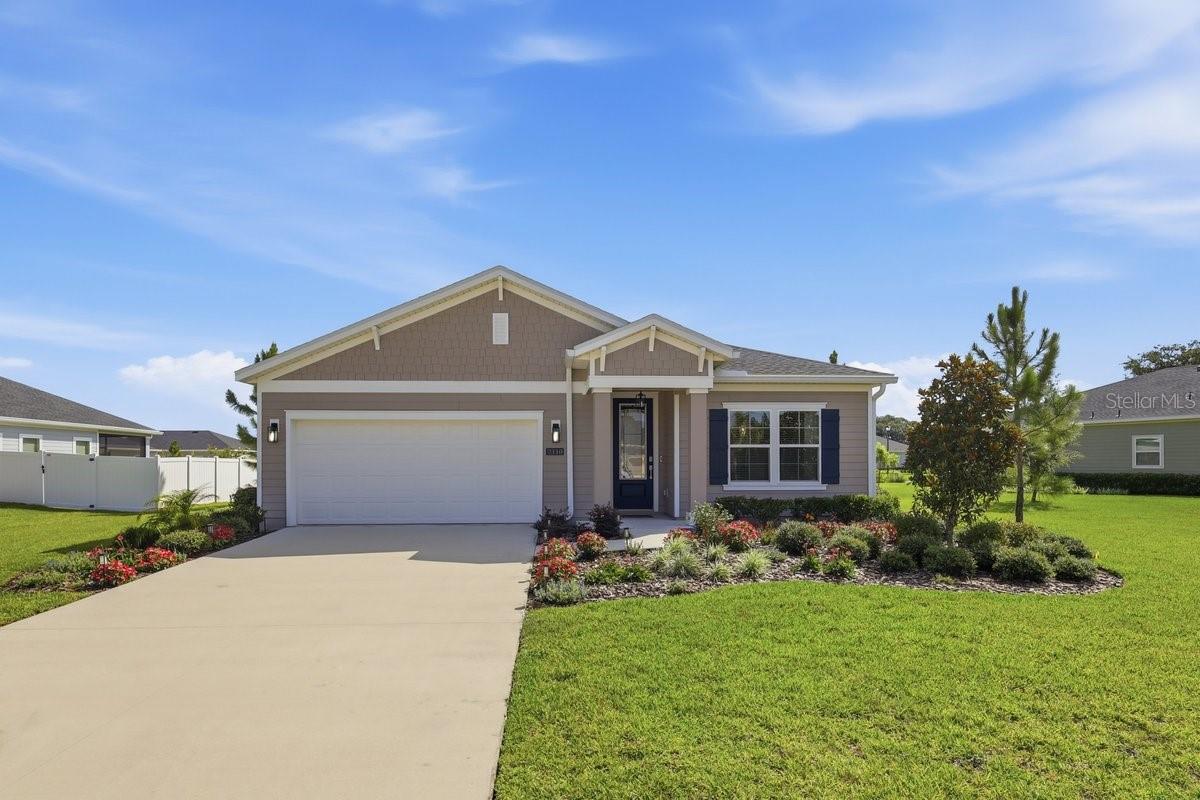 Welcome to 2110 Raglan Circle, a beautifully updated and meticulously maintained home that perfectly blends style, comfort, and functionality. Featuring wood-look tile flooring throughout the main living areas and carpet in the bedrooms, this thoughtfully designed residence offers 3 bedrooms, 2 bathrooms, a formal dining room that can also serve as a home office or flex space, and an additional flex area conveniently located between Bedrooms 2 and 3. The open-concept kitchen flows seamlessly into the spacious family room and adjoining dining area, creating the perfect setting for everyday living and entertaining. You'll appreciate the white shaker-style cabinetry, quartz countertops, stainless steel appliance package, and the custom lighting and window blinds thoughtfully added by the current owners to enhance both style and comfort. The private primary suite features an oversized walk-in closet and a well-appointed en-suite bath complete with a soaking tub, separate shower, and private water closet. Step outside to the screened-in rear lanai, an inviting space to relax, entertain, or simply enjoy Florida's year-round outdoor lifestyle. The partially fenced backyard can easily be enclosed to create a fully fenced yard, offering even more privacy and flexibility.

Additional features include rain gutters, an irrigation well for convenient and cost-effective lawn care, and beautifully landscaped grounds with a lush, meticulously maintained lawn that provides exceptional curb appeal.

Located just 10 minutes from Flagler Beach, you'll have easy access to miles of beautiful Atlantic coastline. Grab your beach chairs and umbrella and spend the day enjoying the sun, surf, and relaxed coastal lifestyle that makes this area so special.
Every detail of this exceptional home reflects true pride of ownership. Move-in ready and beautifully appointed, 2110 Raglan Circle is nestled within the desirable Wexford Reserve community, known for its generously sized homesites--a rare feature compared to many newer neighborhoods. It's just one more reason residents love calling Wexford Reserve home.